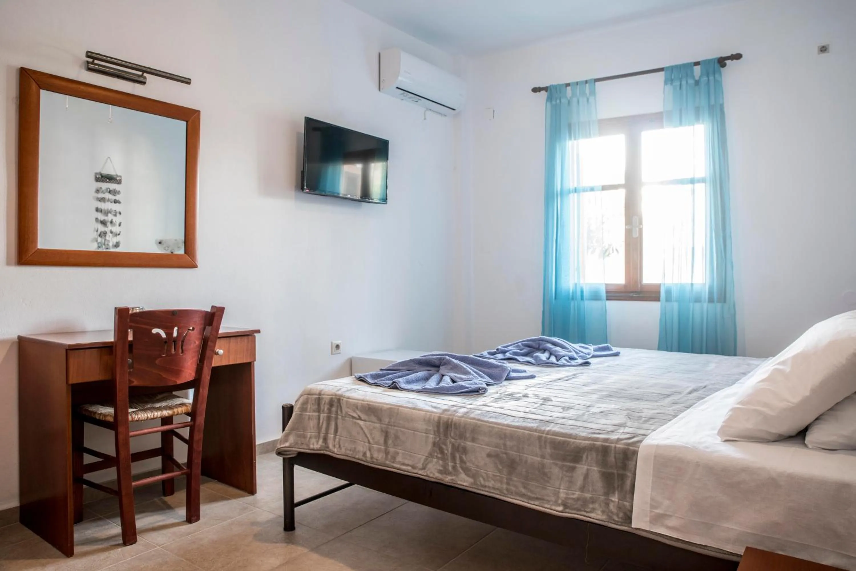 Bed in Bella Vita Style rooms & apartments