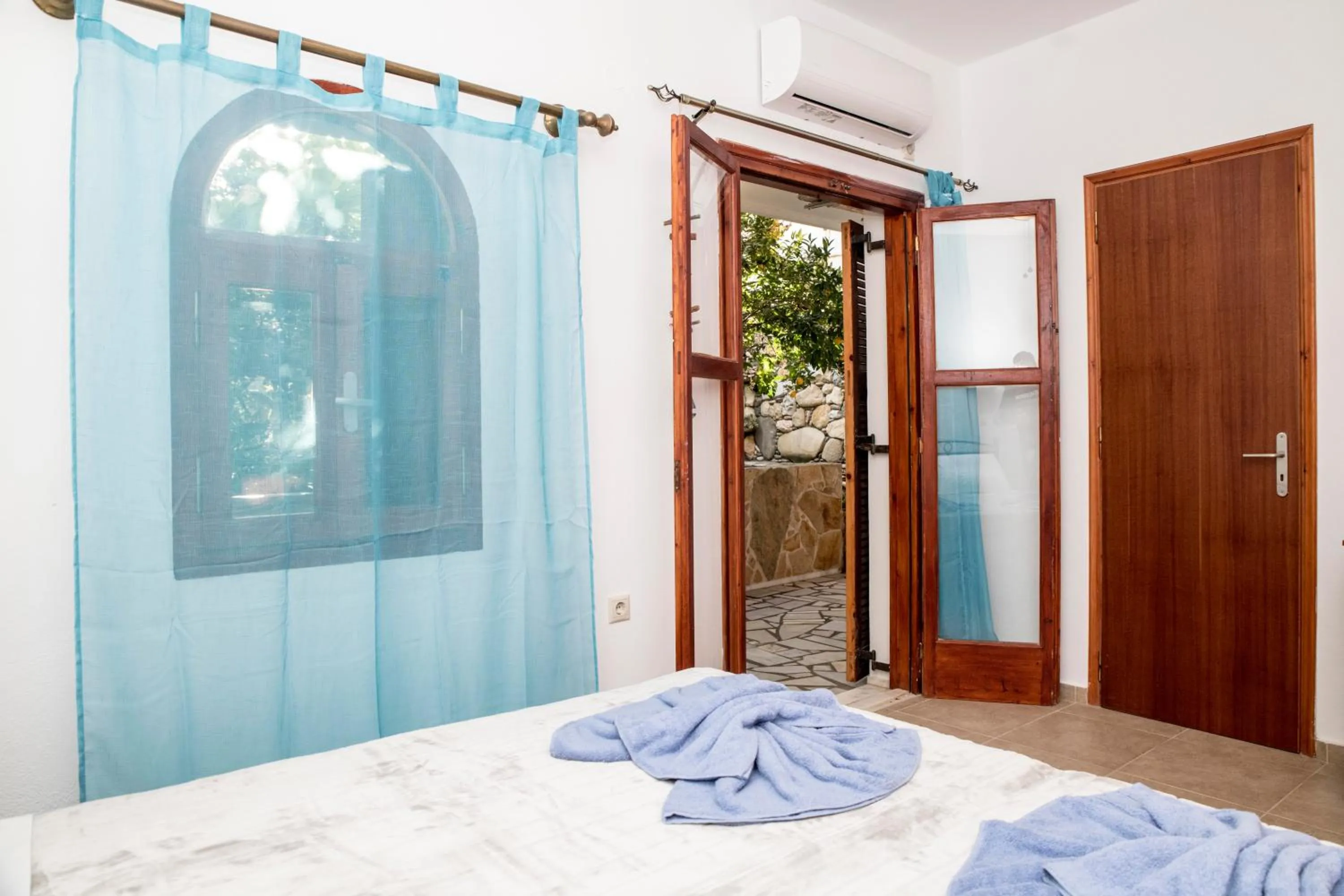 Bed in Bella Vita Style rooms & apartments