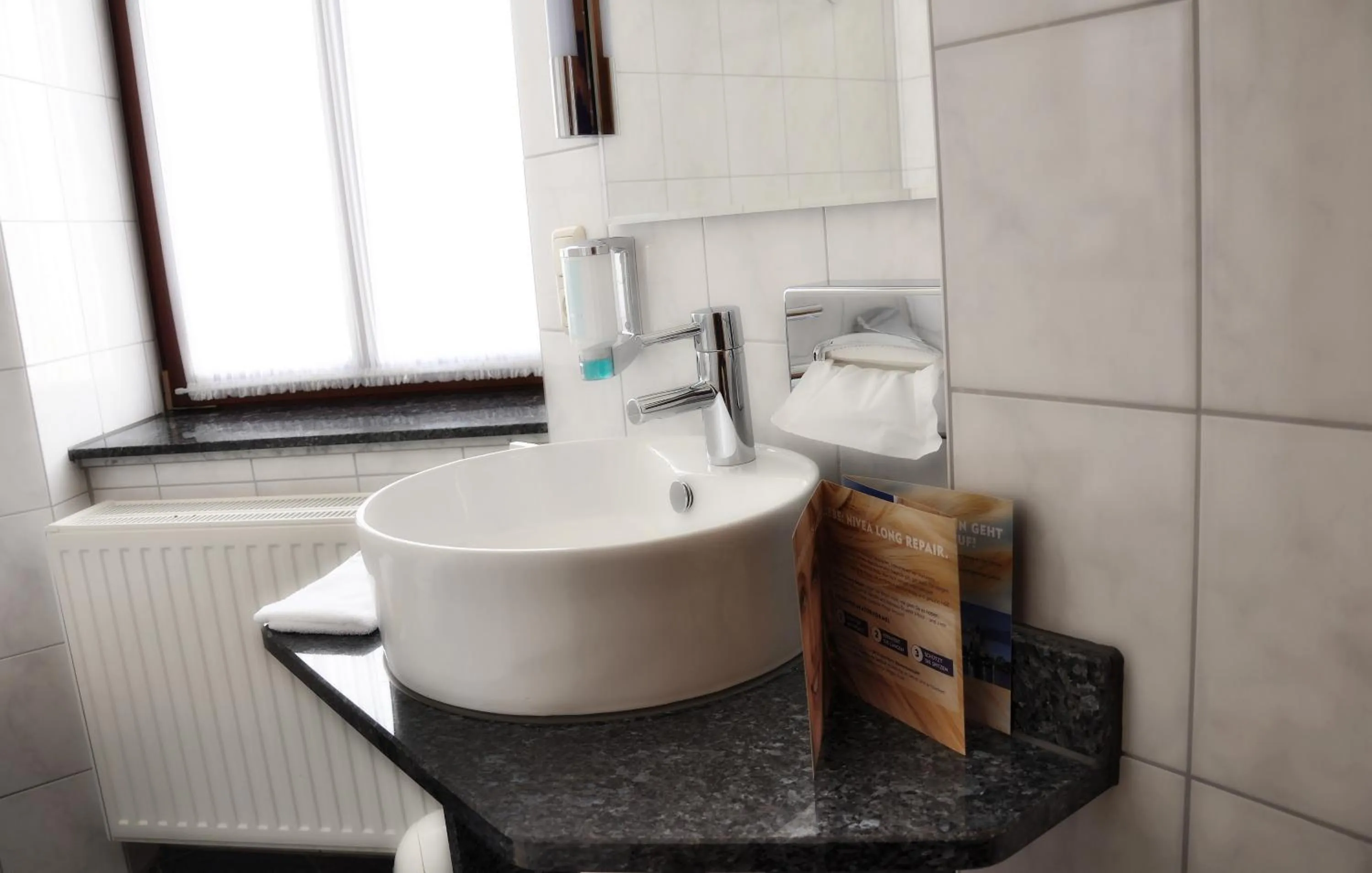 Bathroom in Dappers Wellness Hotel