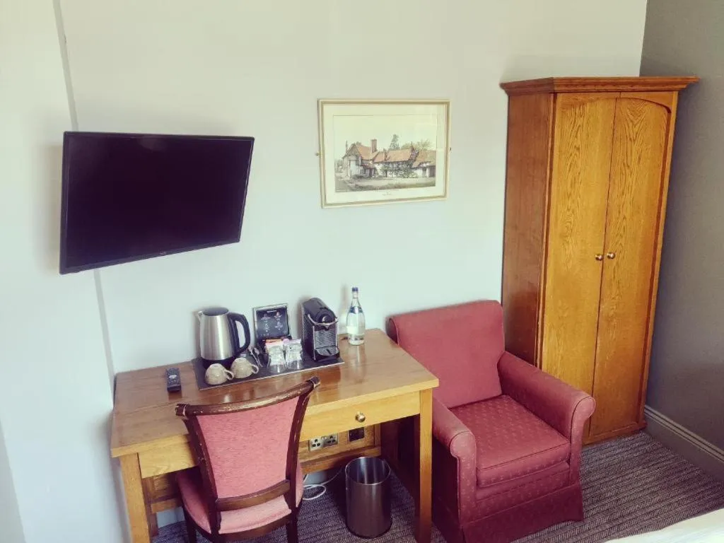 Bedroom in The Greyhound Inn