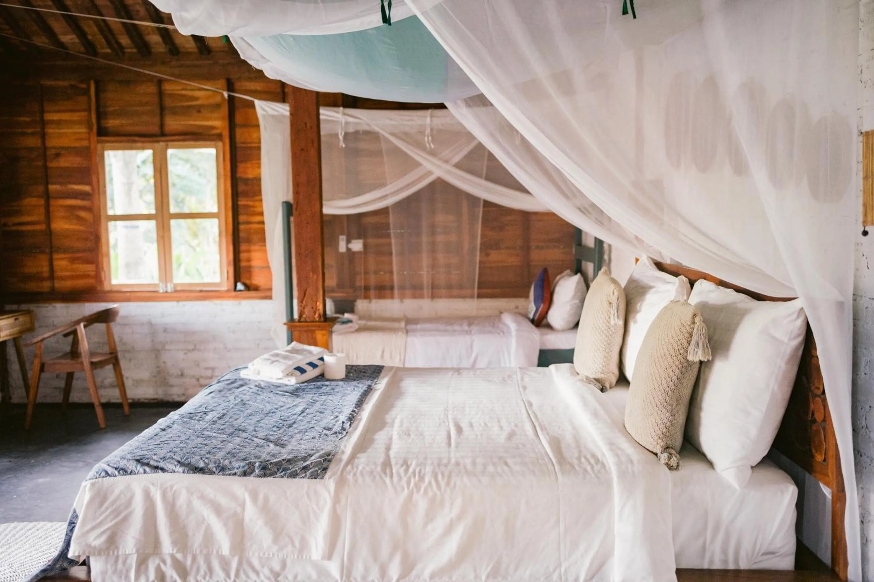 Bed in Ubuntu Bali Eco Yoga Retreat - CANGGU