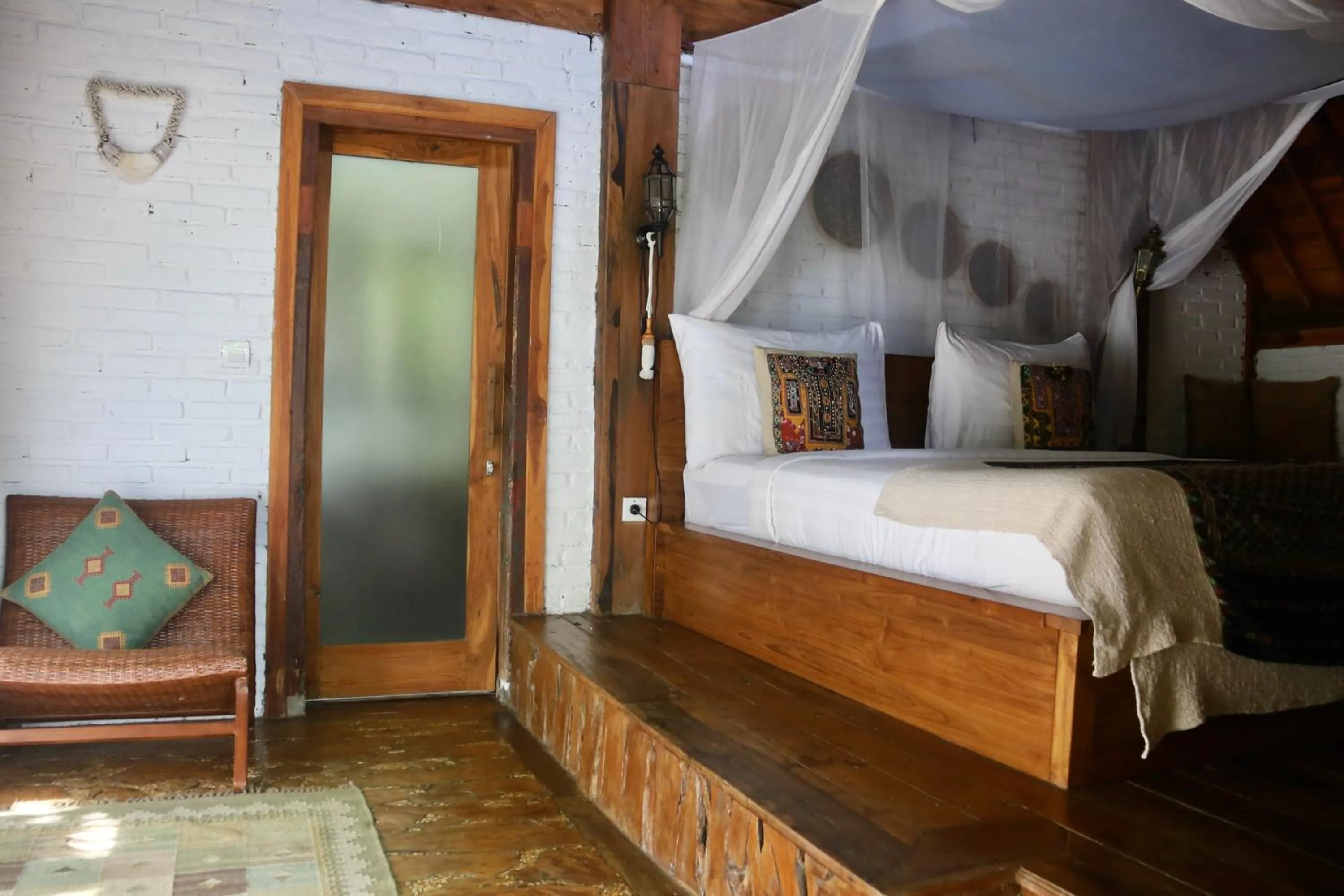 Photo of the whole room, Bed in Ubuntu Bali Eco Yoga Retreat - CANGGU