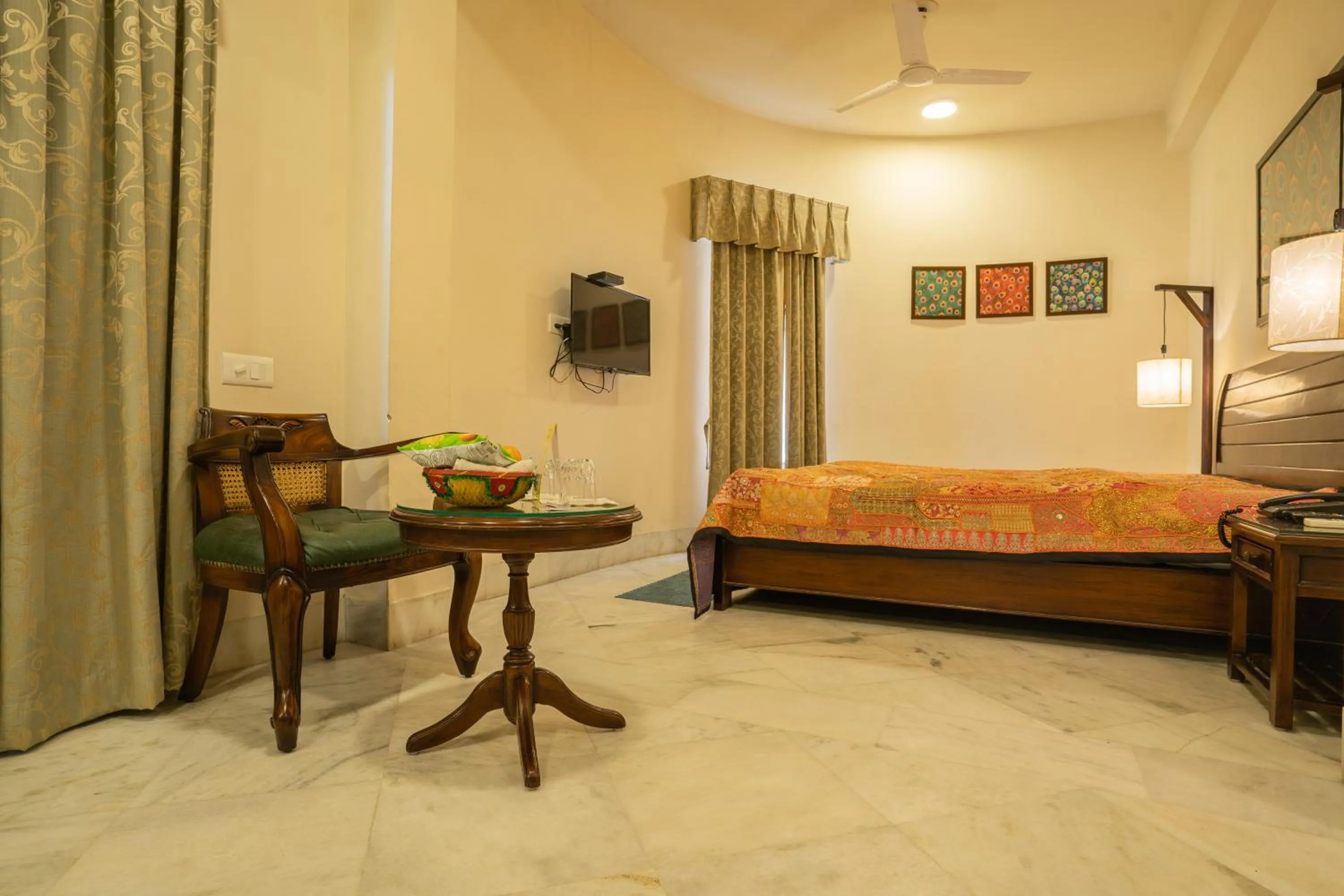 Bed in Tripli Hotels Shambhu Villas