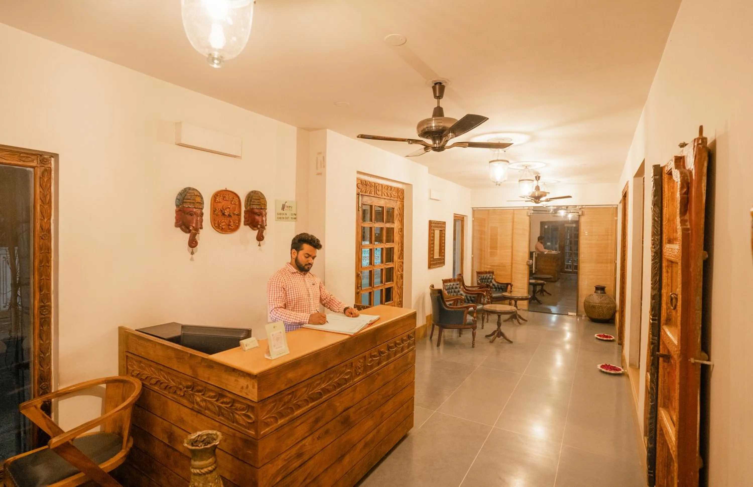 Lobby or reception in Tripli Hotels Shambhu Villas