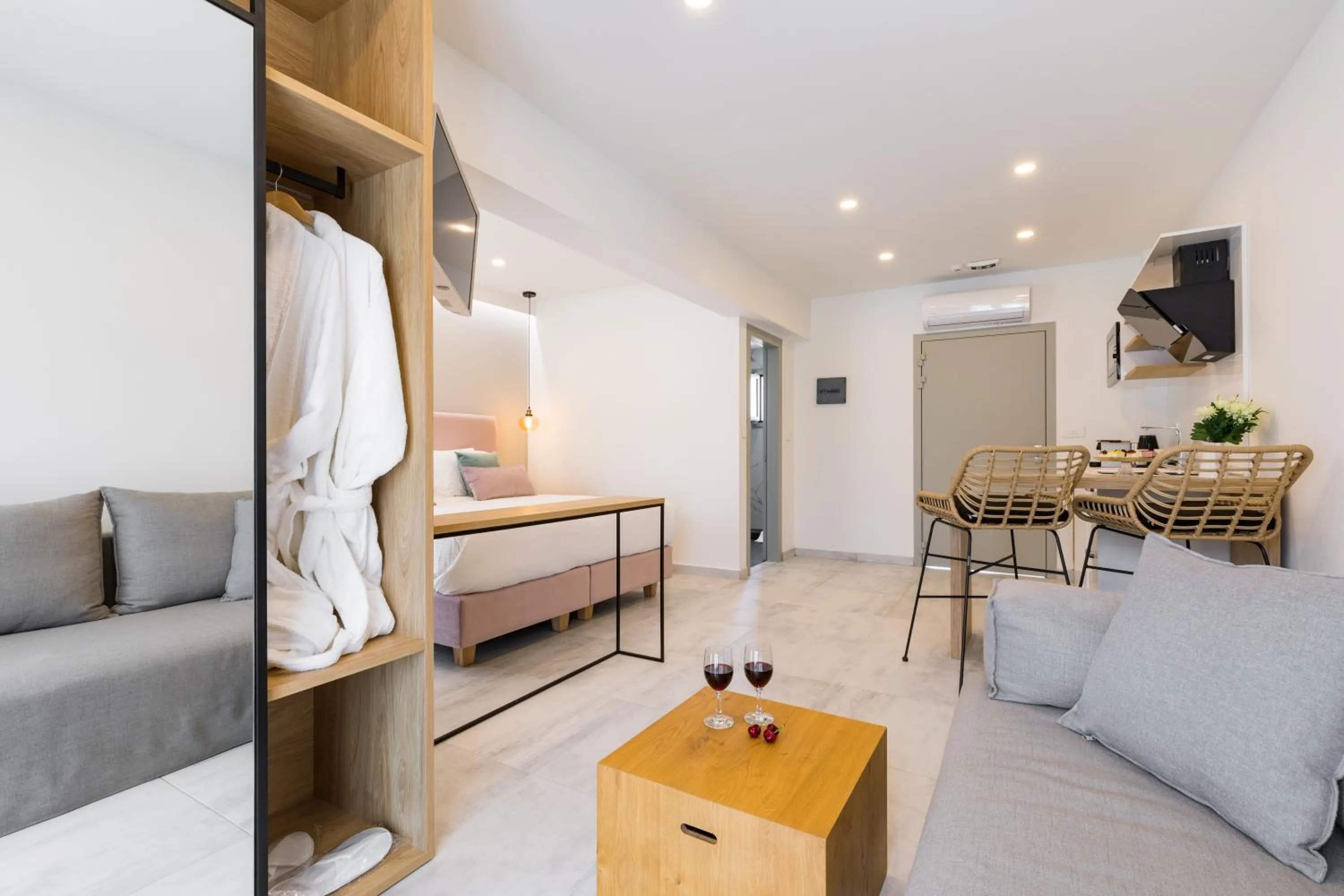 Living room, Bed in V Luxury Suites