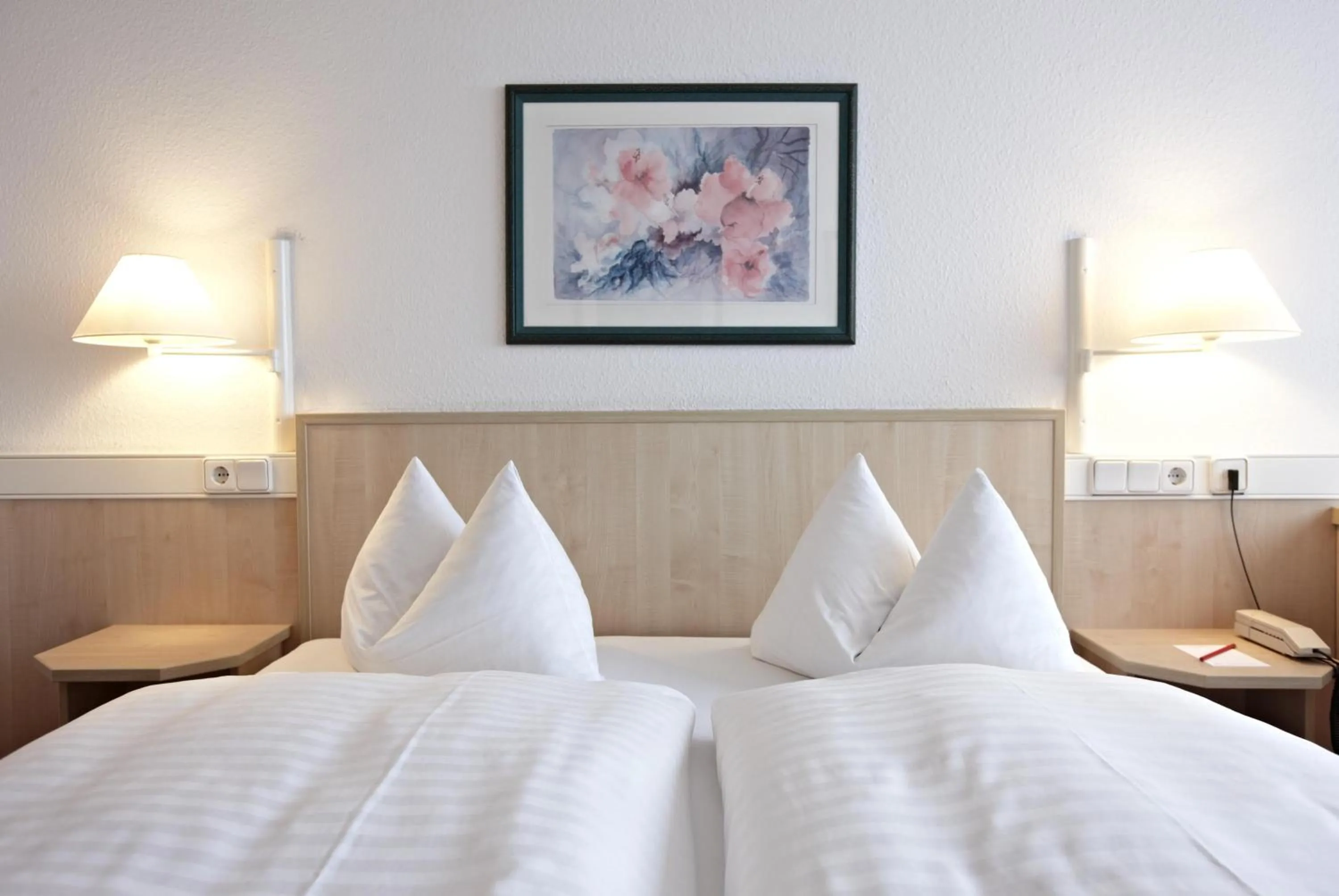 Photo of the whole room, Bed in IntercityHotel Schwerin