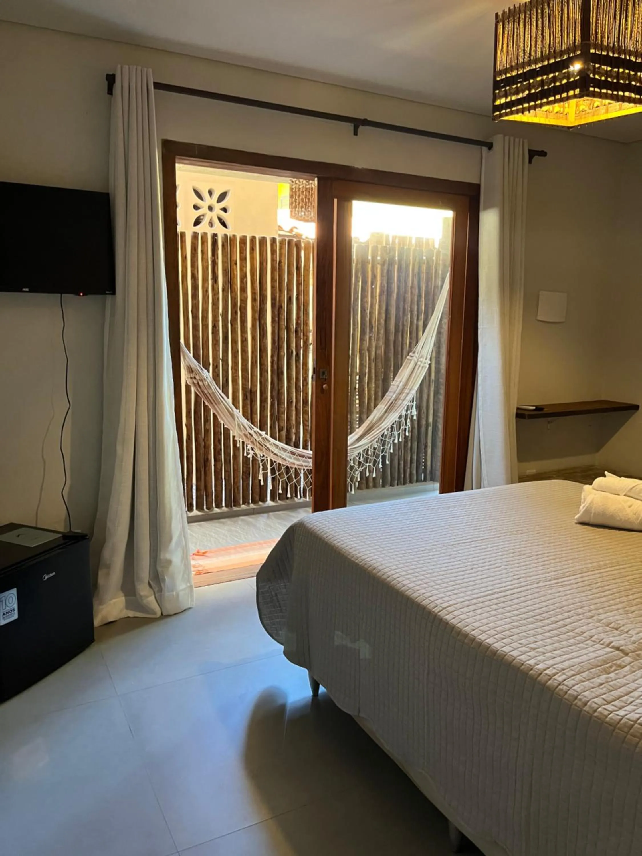 Bed in Pousada Vilarejo