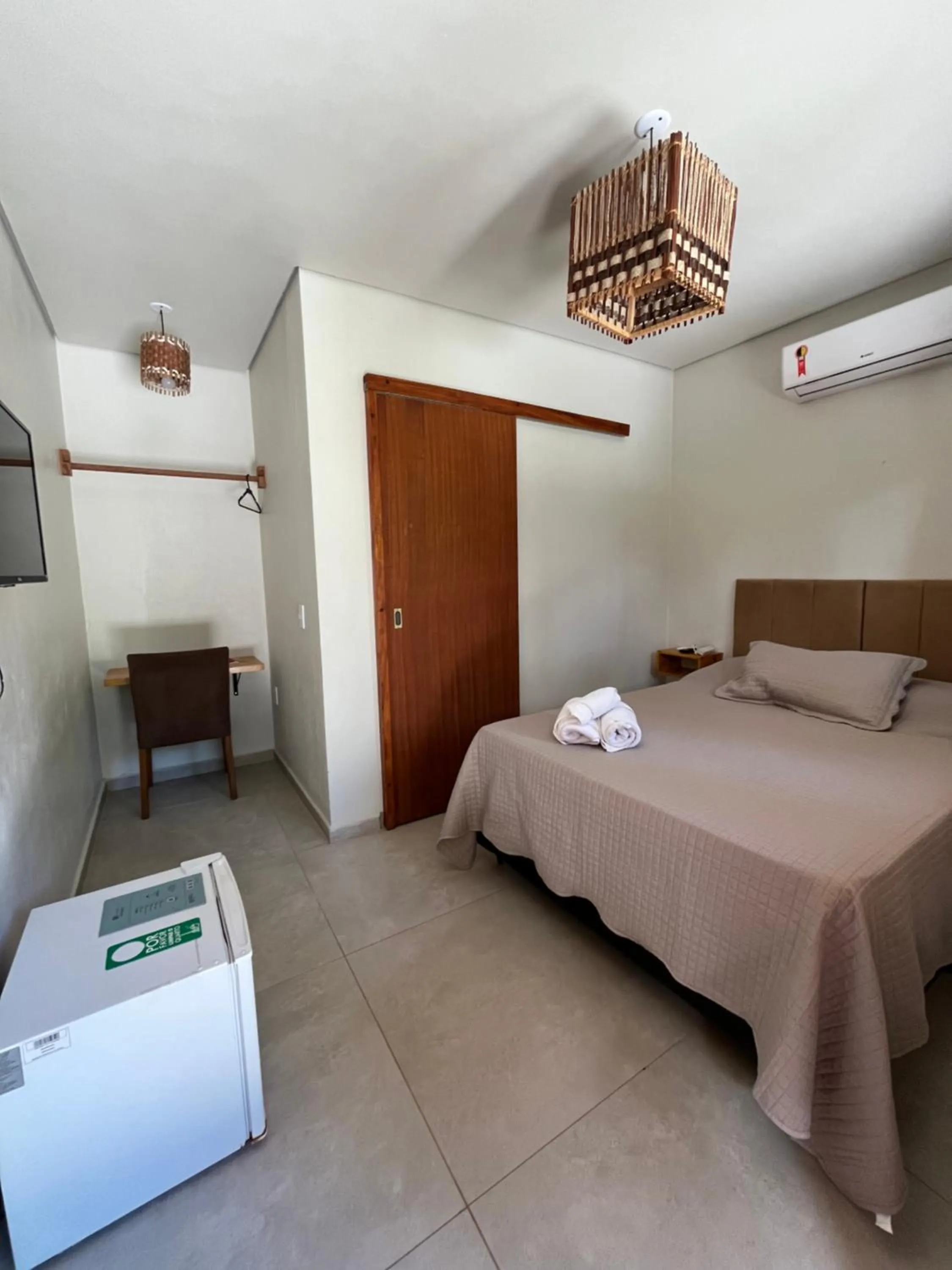 Photo of the whole room, Bed in Pousada Vilarejo