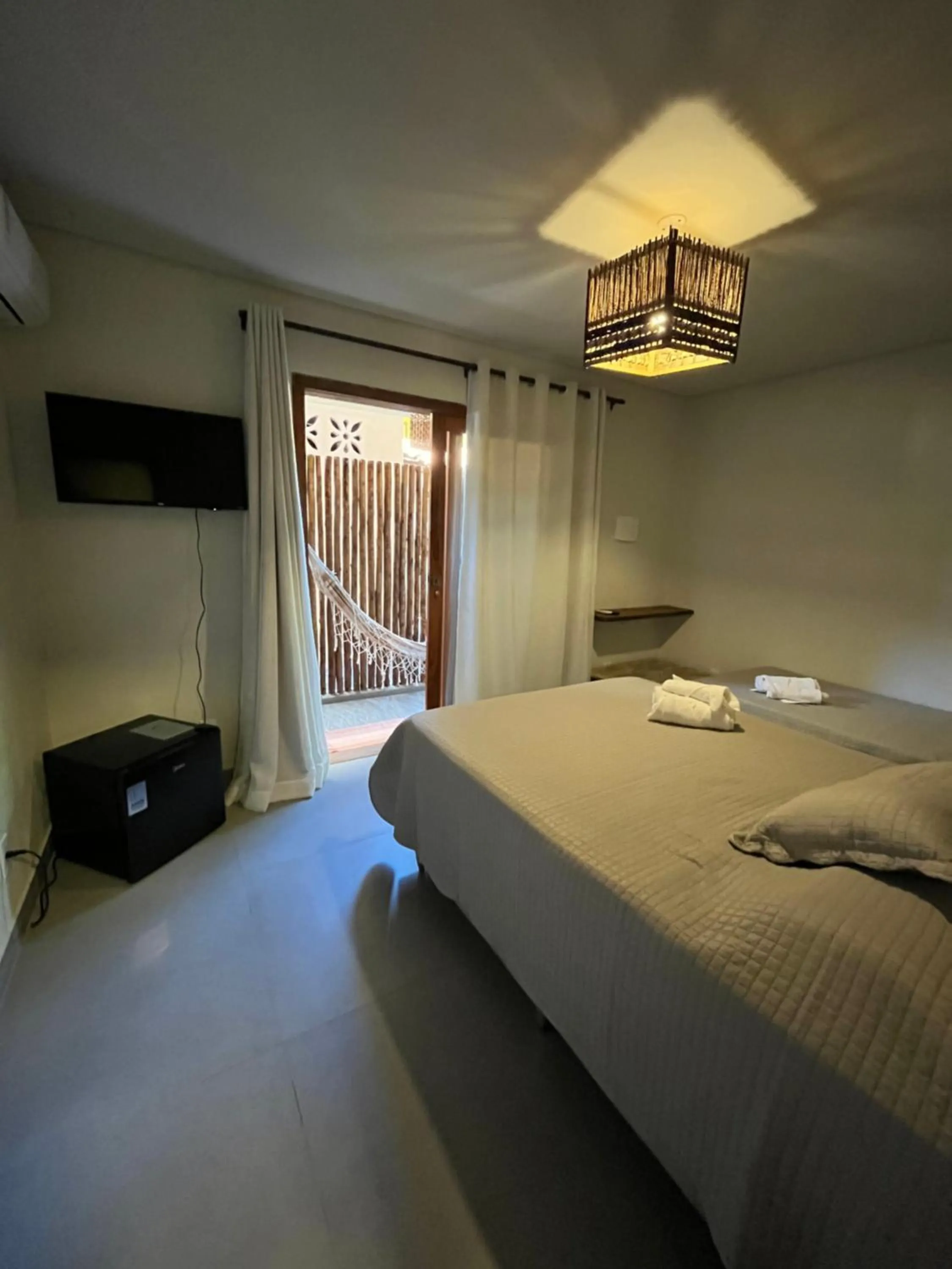 Bed in Pousada Vilarejo