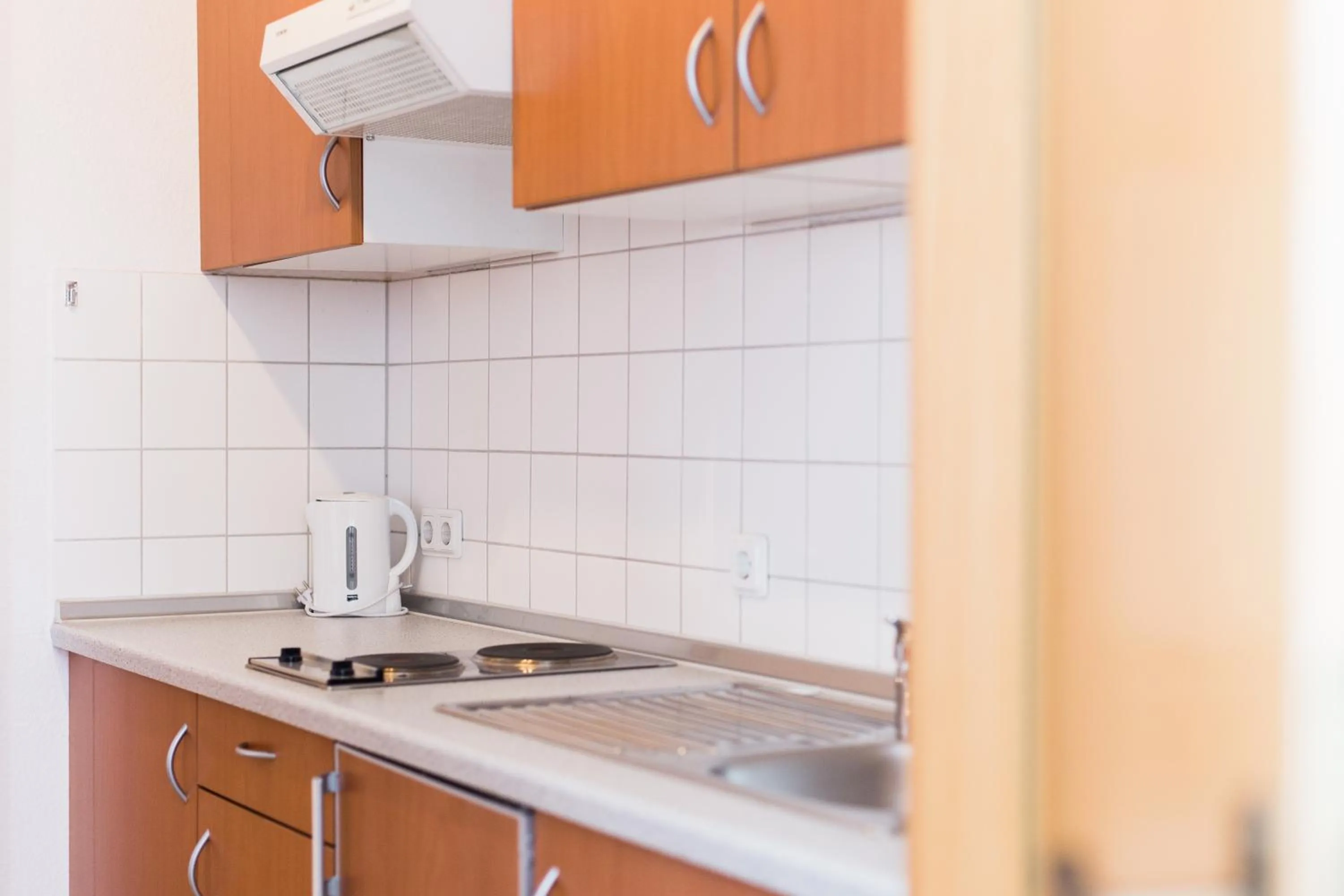 Kitchen or kitchenette in Altwernigeröder Apparthotel