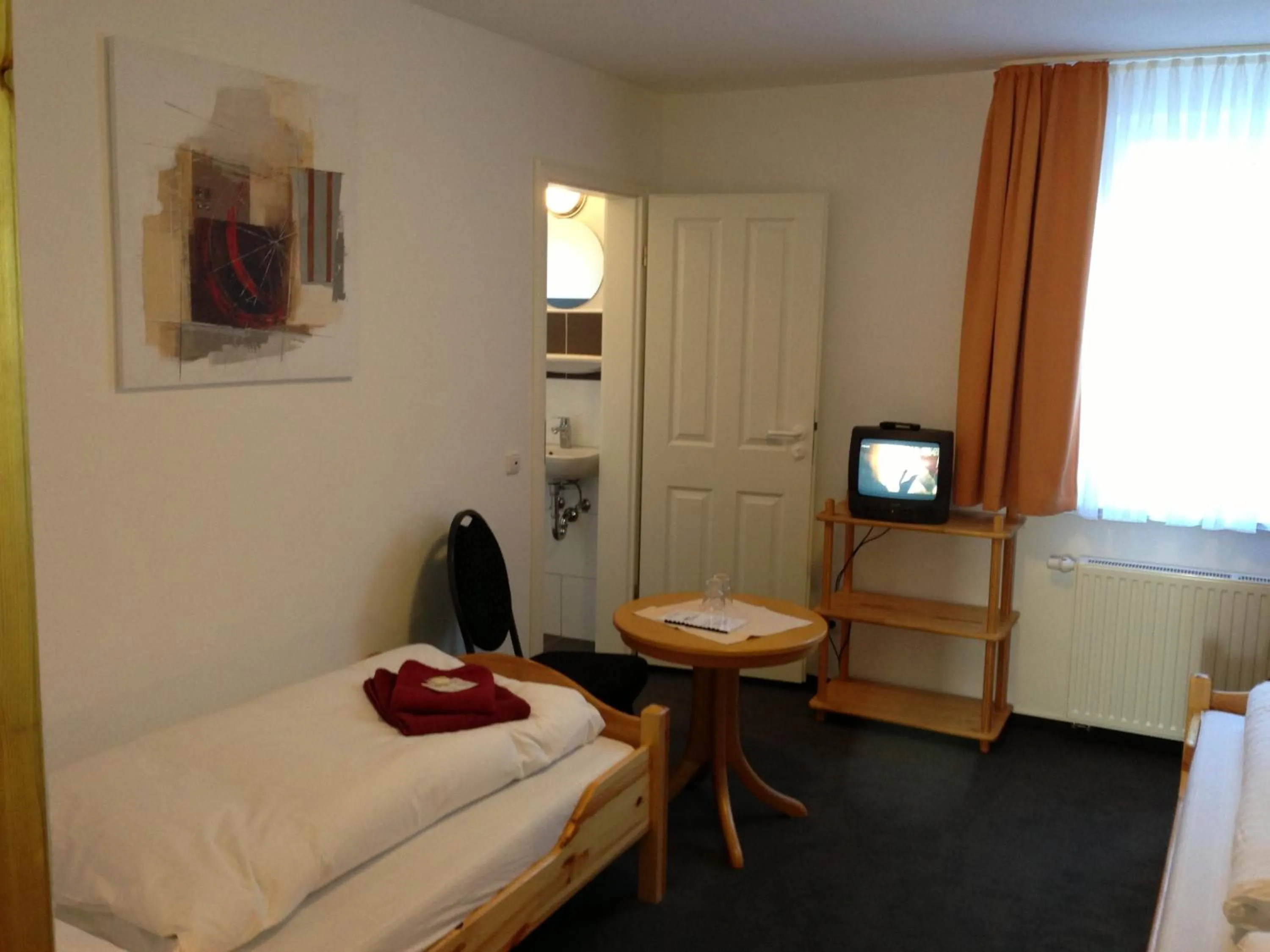 Photo of the whole room, Bed in Hotel & Restaurant Jägerstuben