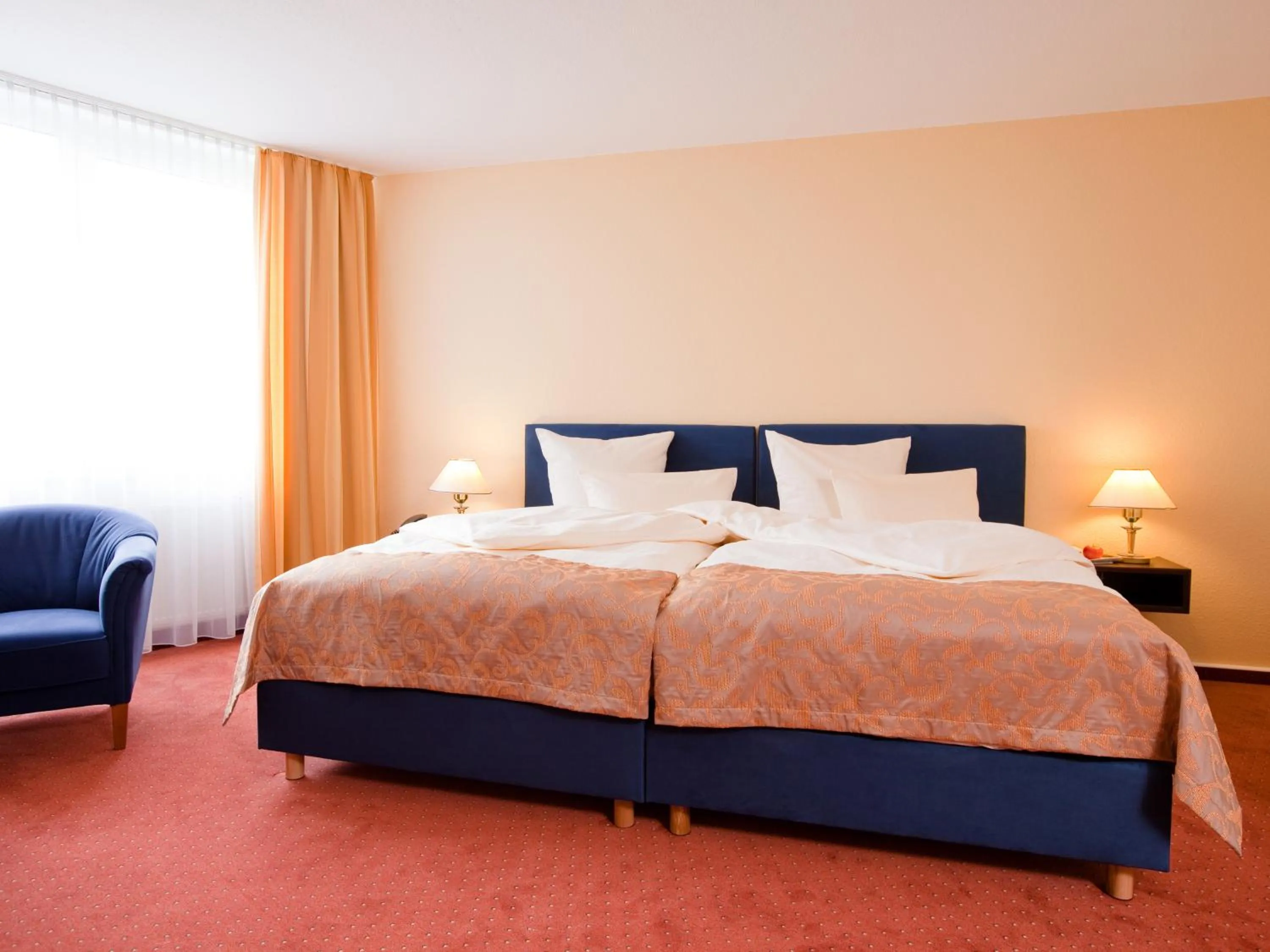 Photo of the whole room, Bed in Carathotel Basel/Weil am Rhein