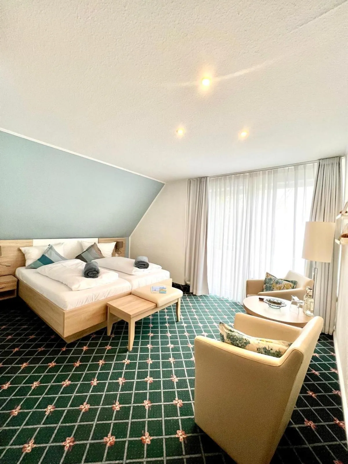 Photo of the whole room, Bed in Kirchspielkrug Landhotel & Restaurant