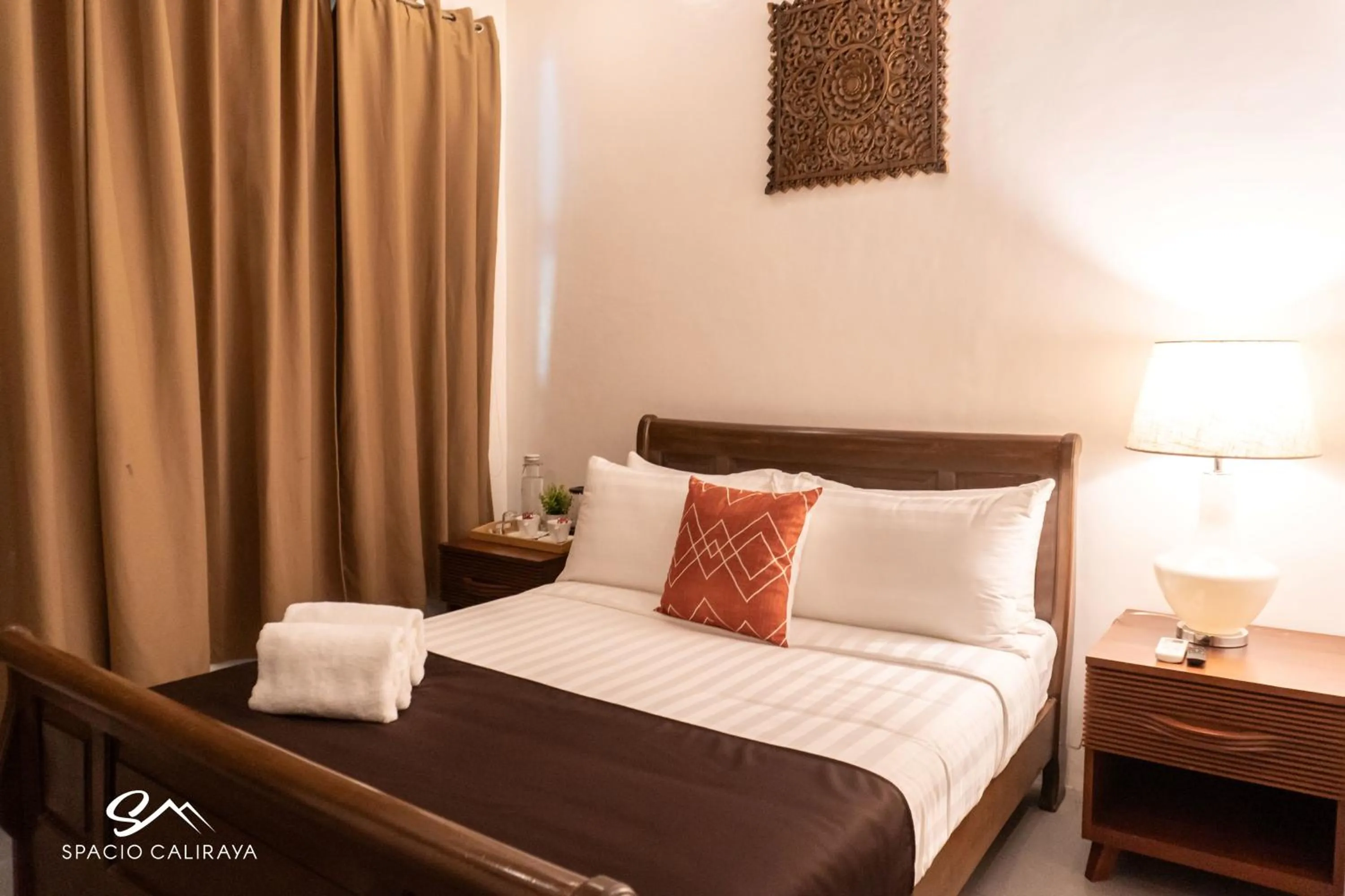 Bed in Spacio Caliraya Bed & Breakfast