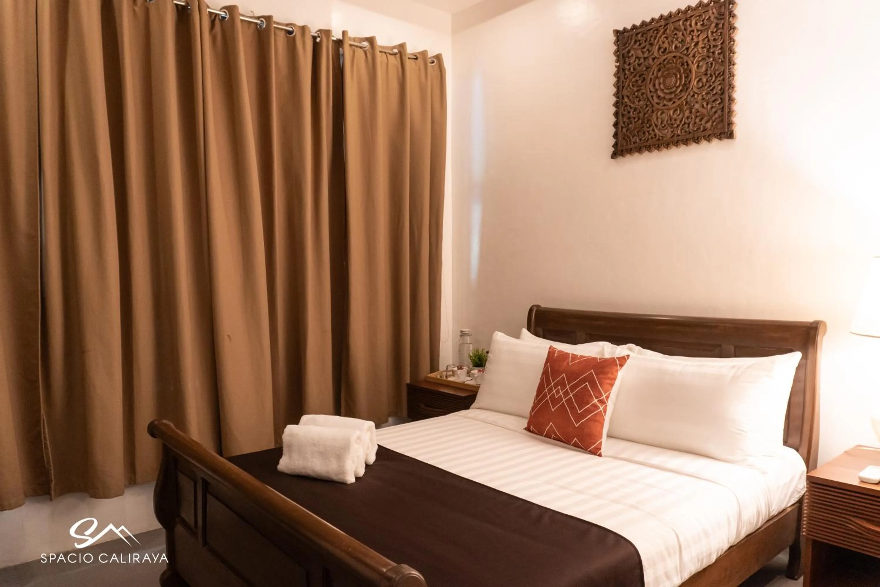 Bed in Spacio Caliraya Bed & Breakfast