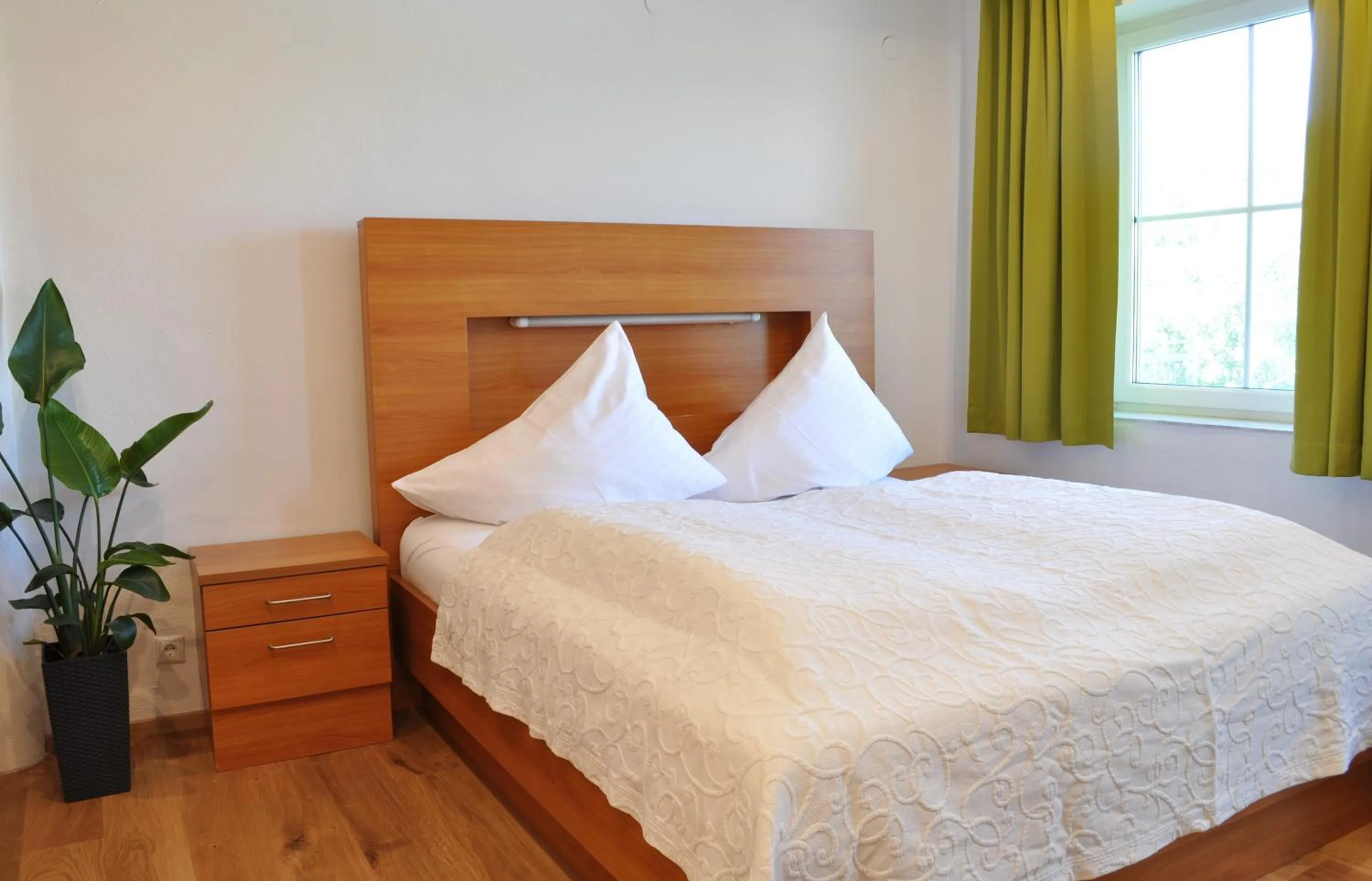 Photo of the whole room, Bed in Seehotel Herlinde