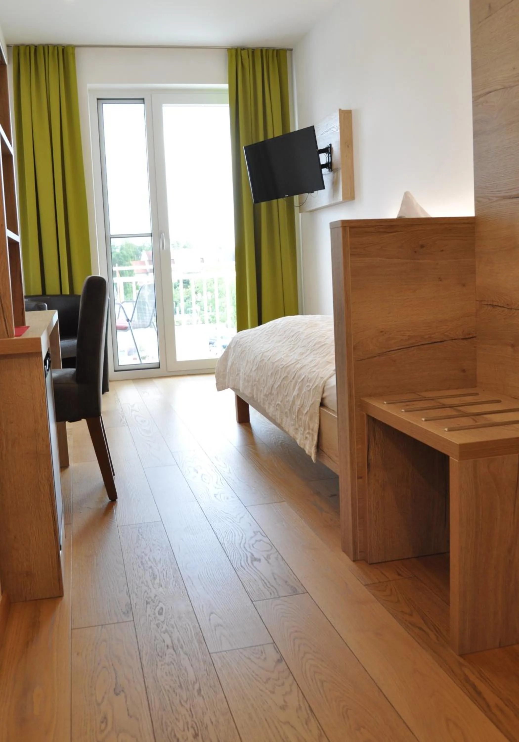 Photo of the whole room, Bed in Seehotel Herlinde