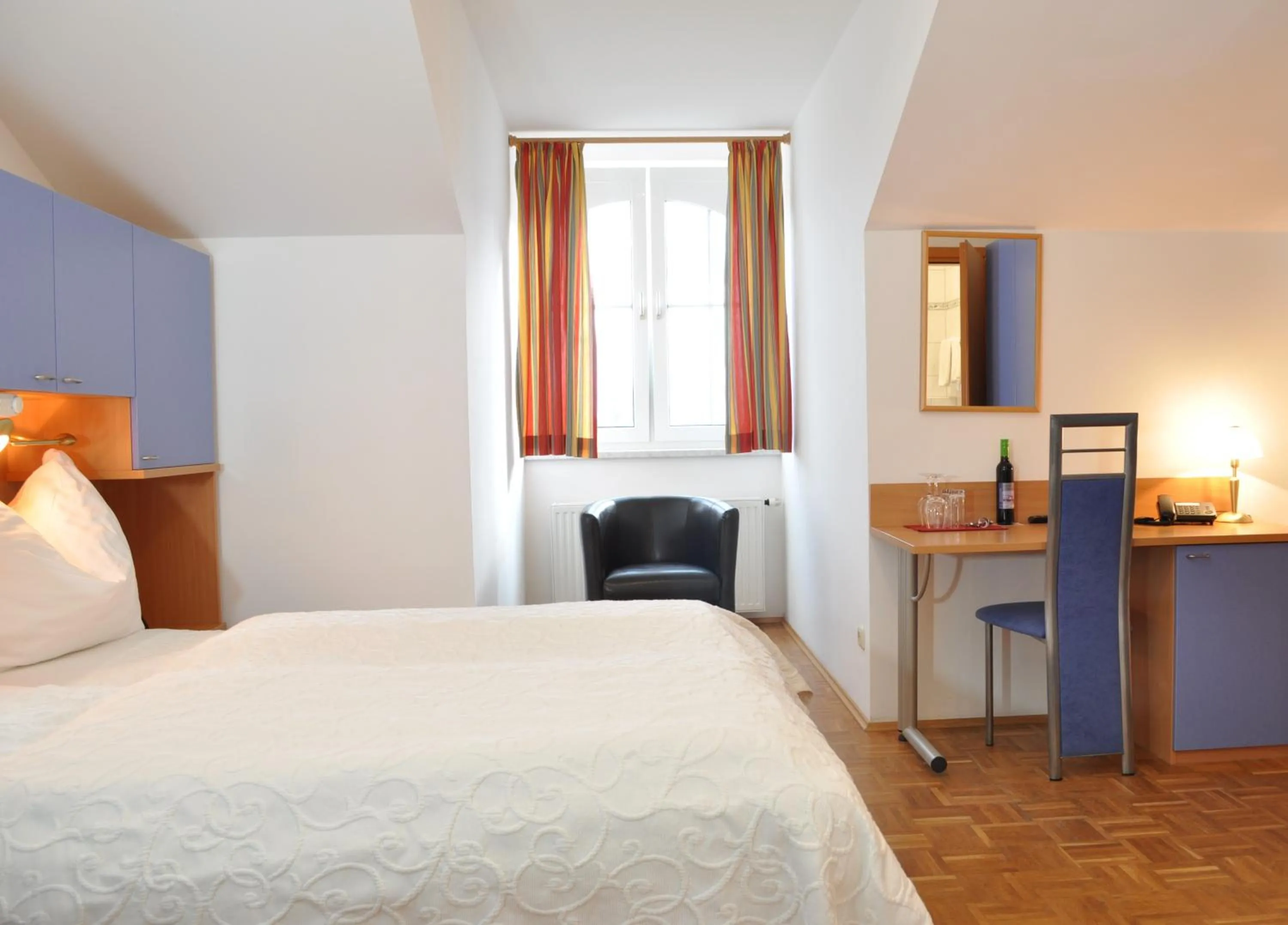 Photo of the whole room, Bed in Seehotel Herlinde