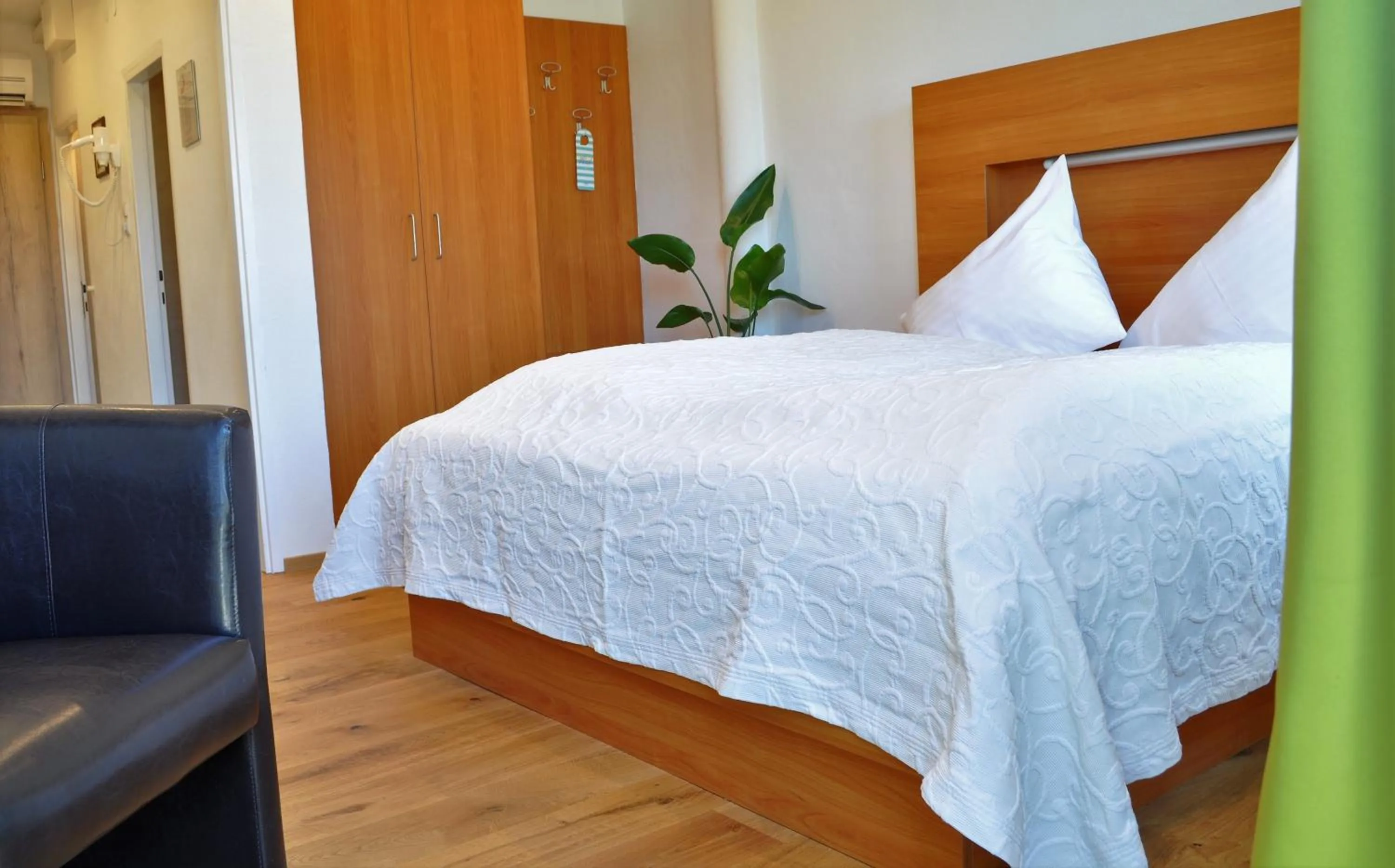 Photo of the whole room, Bed in Seehotel Herlinde