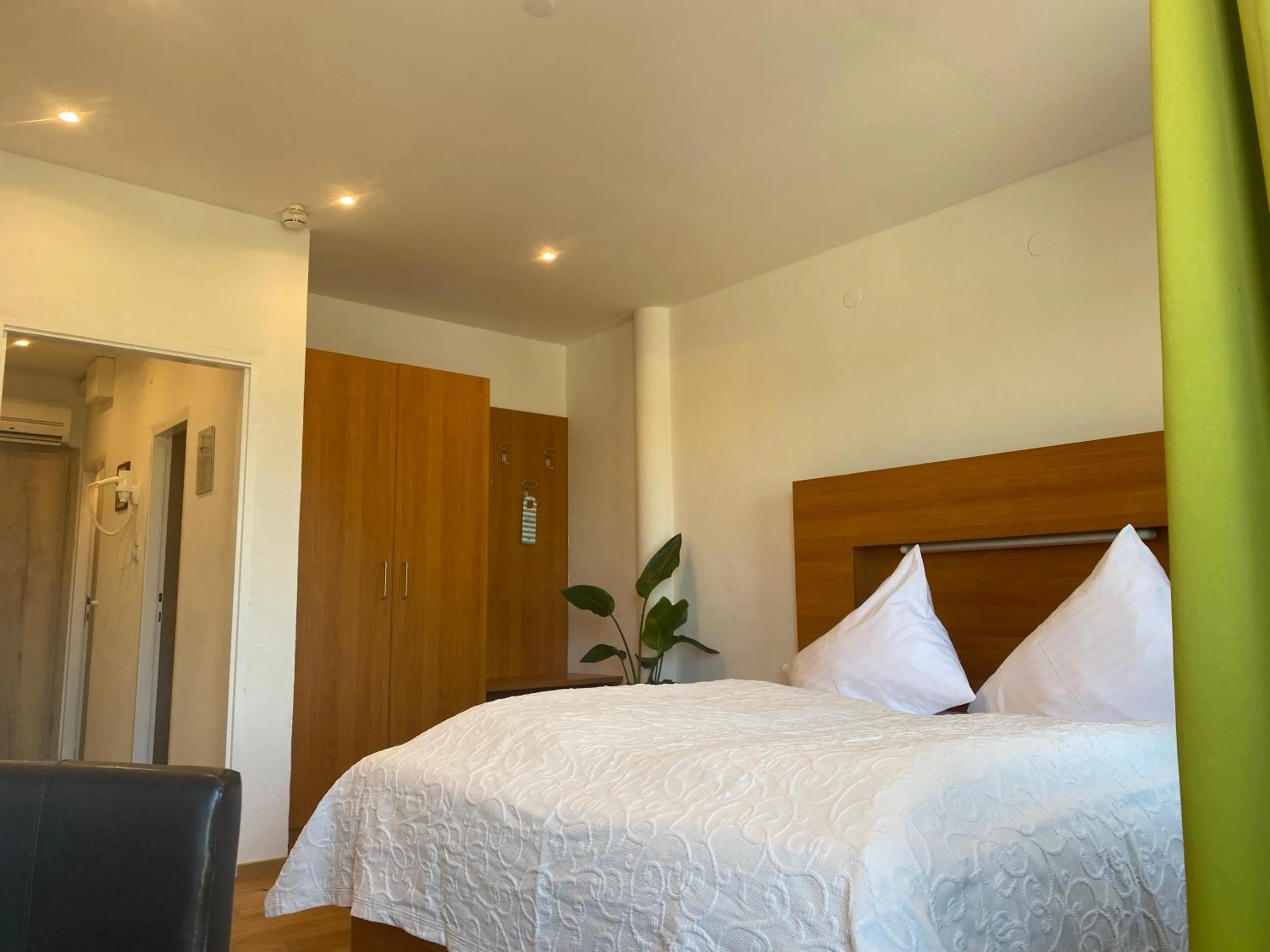 Photo of the whole room, Bed in Seehotel Herlinde