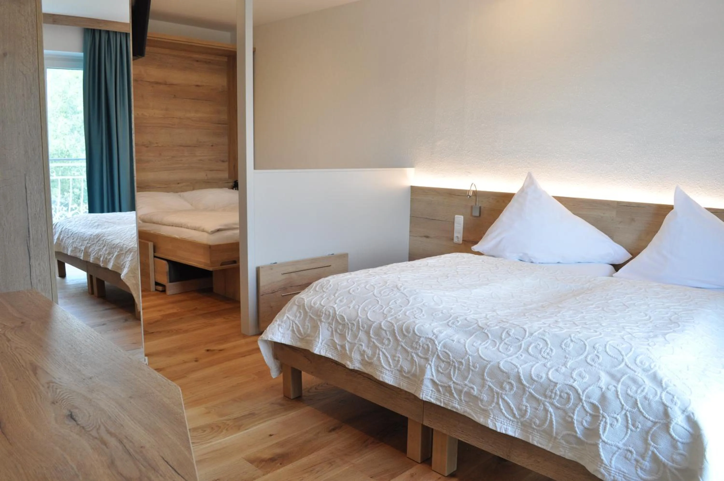Photo of the whole room, Bed in Seehotel Herlinde