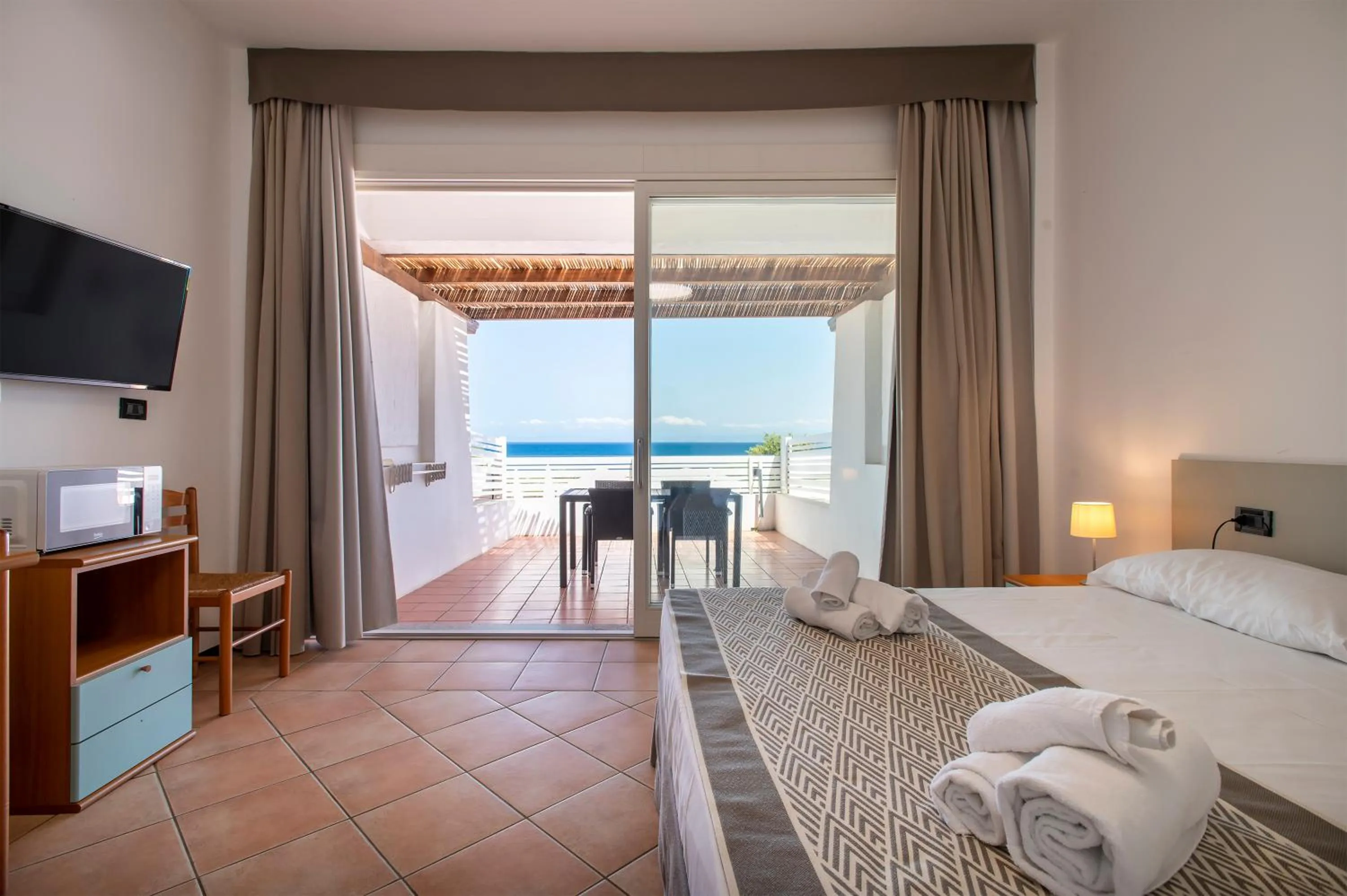 Photo of the whole room, Bed in Residence Le Vele