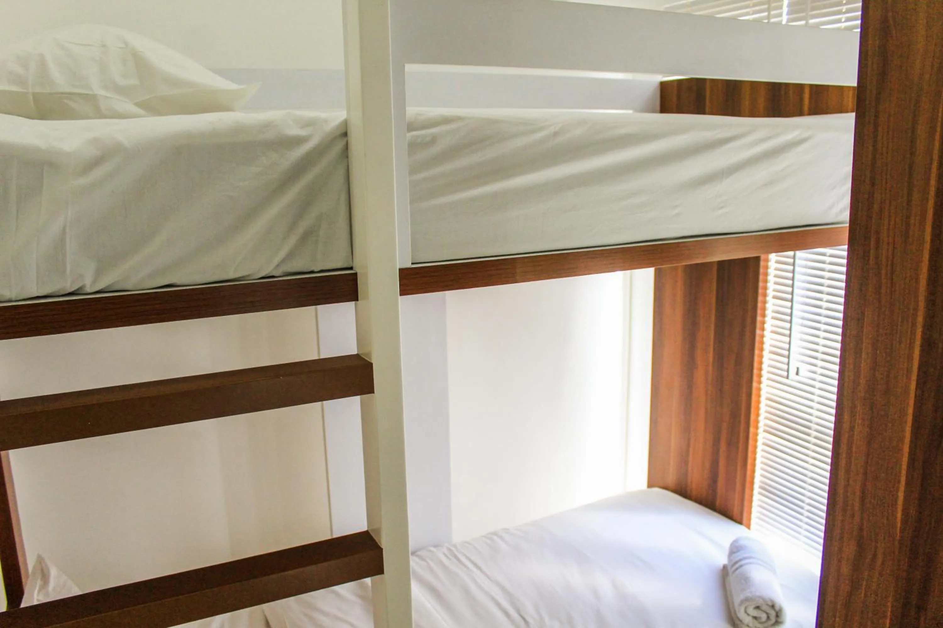 Bed in Relaxing 2BR Apartment at M-Town Residence By Travelio