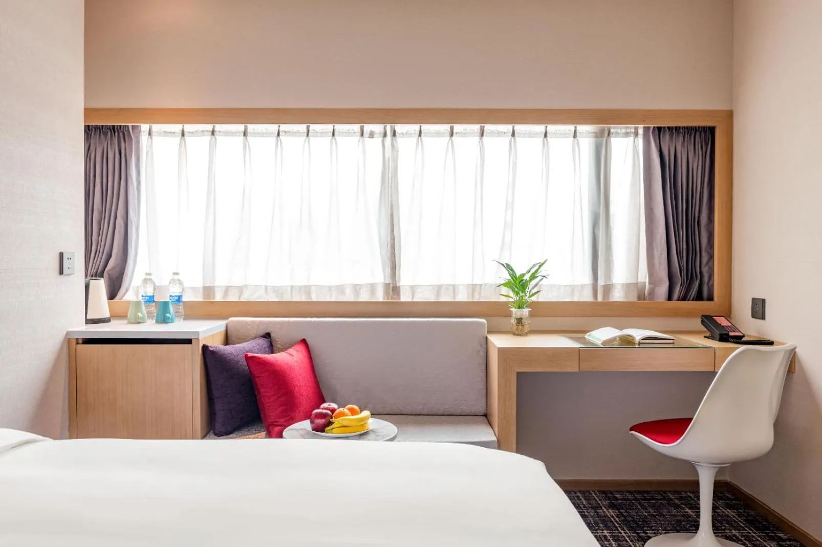 Seating area, Bed in Xence hotel near Xiamen Airport & SM Mall