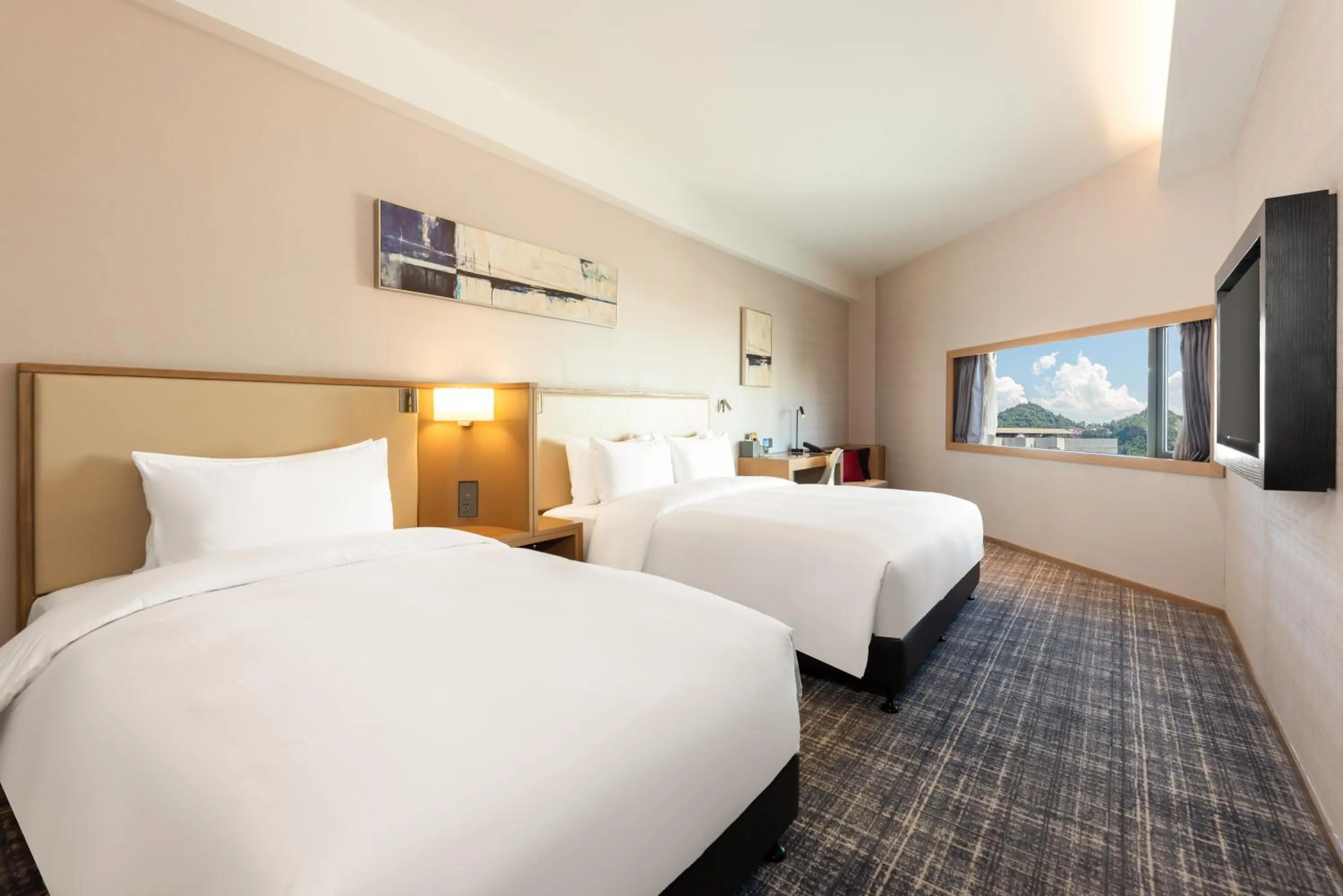 Photo of the whole room, Bed in Xence hotel near Xiamen Airport & SM Mall