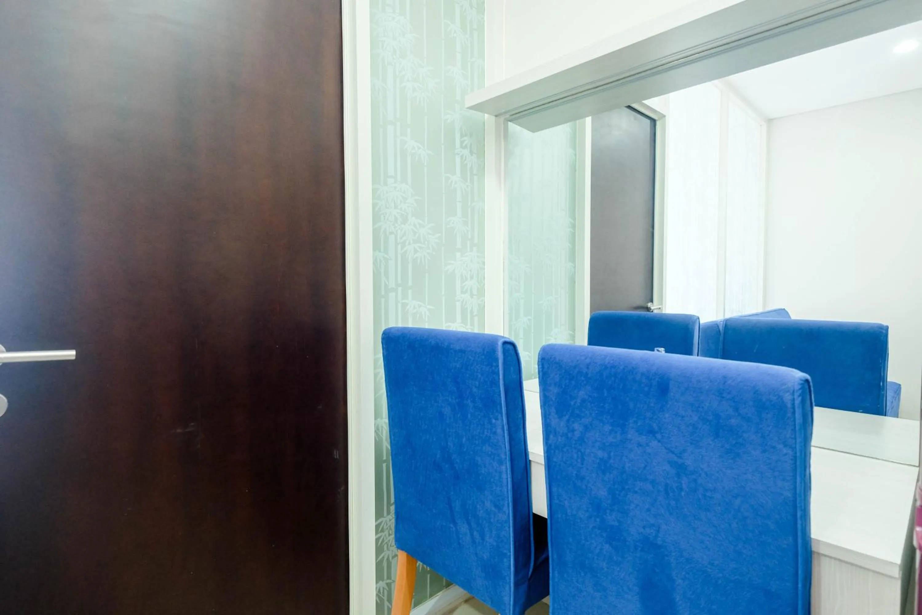 Dining area in Cozy and Modern 1BR Apartment at Atlanta Residences By Travelio