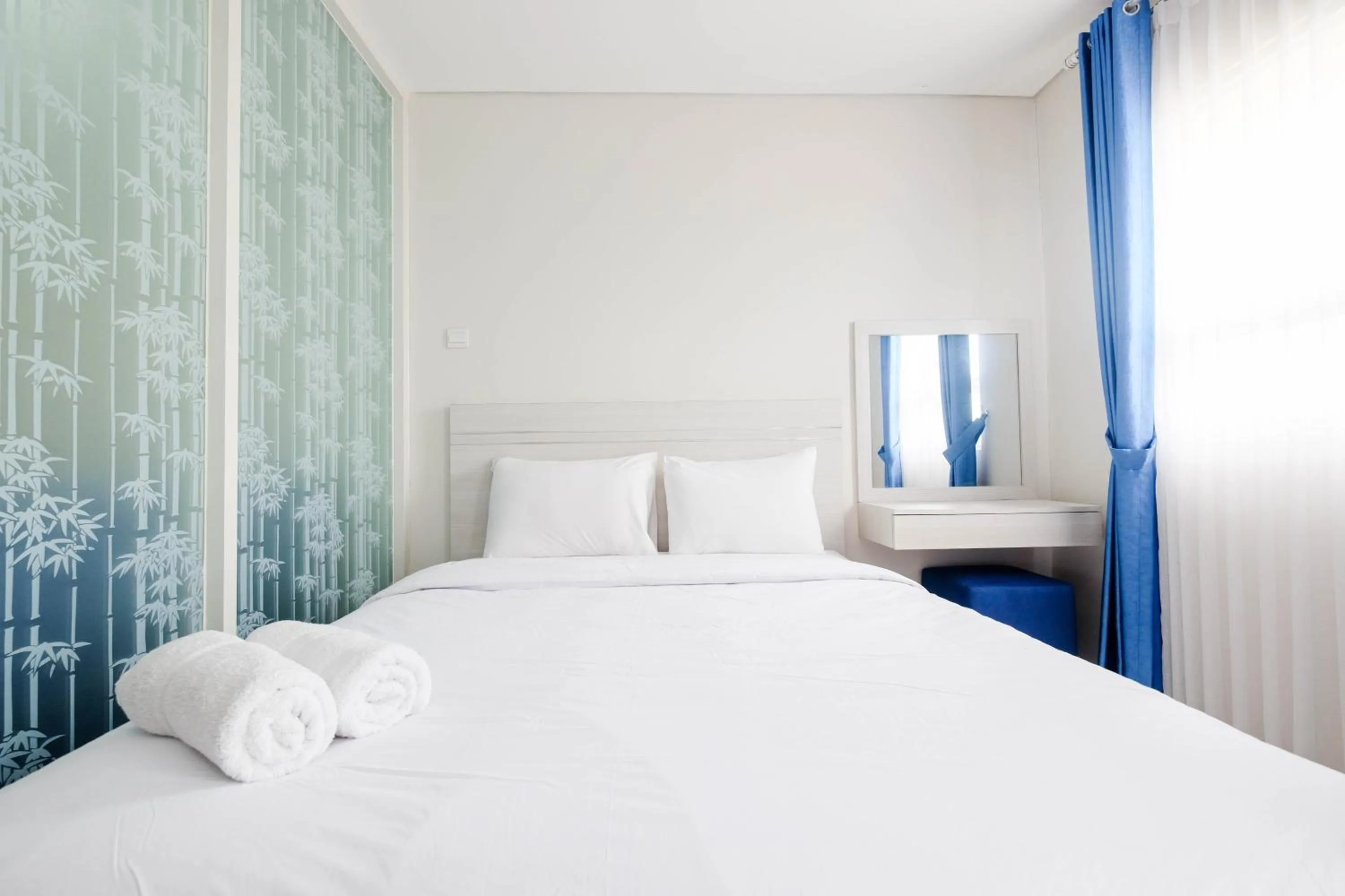 Bed in Cozy and Modern 1BR Apartment at Atlanta Residences By Travelio