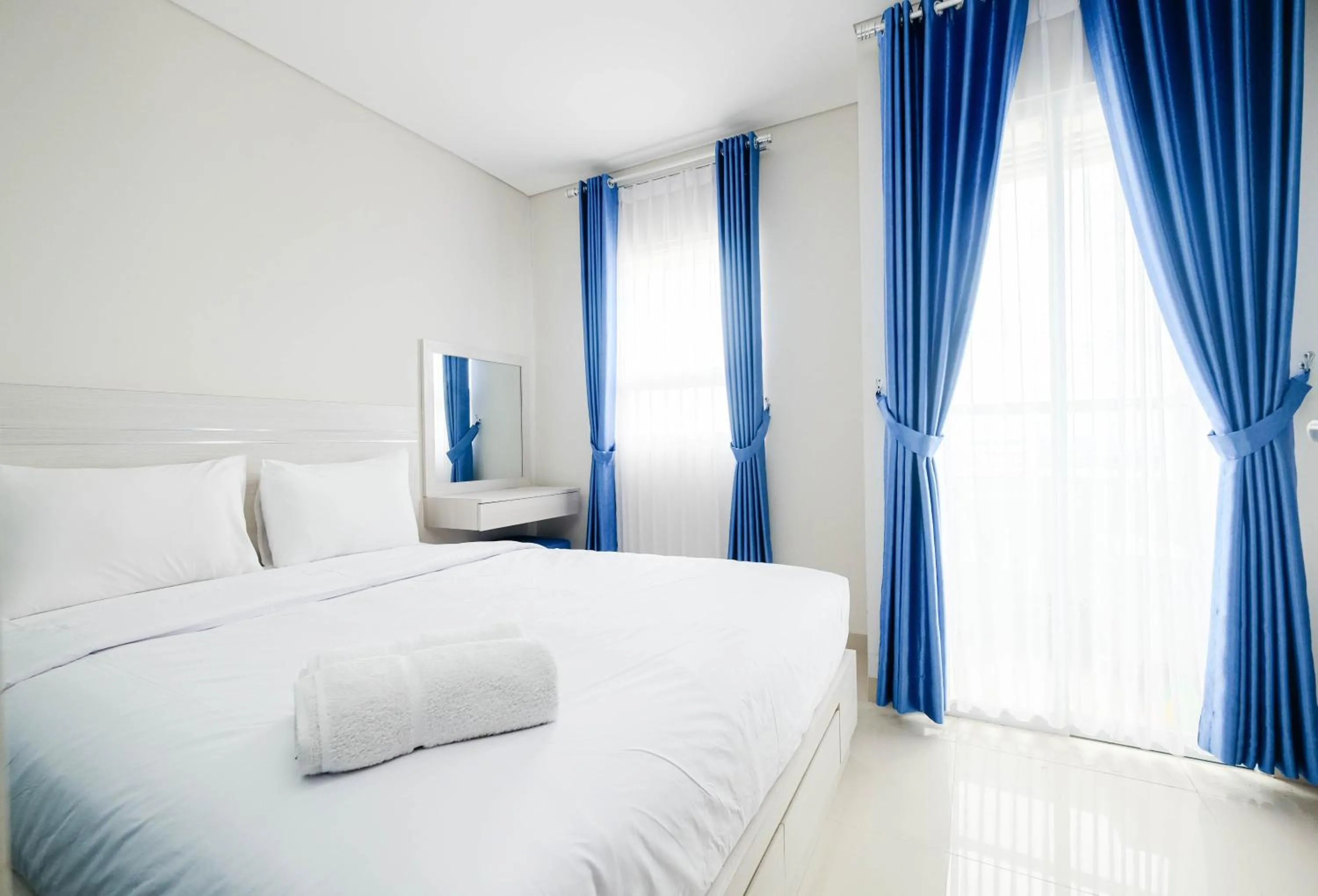 Bed in Cozy and Modern 1BR Apartment at Atlanta Residences By Travelio