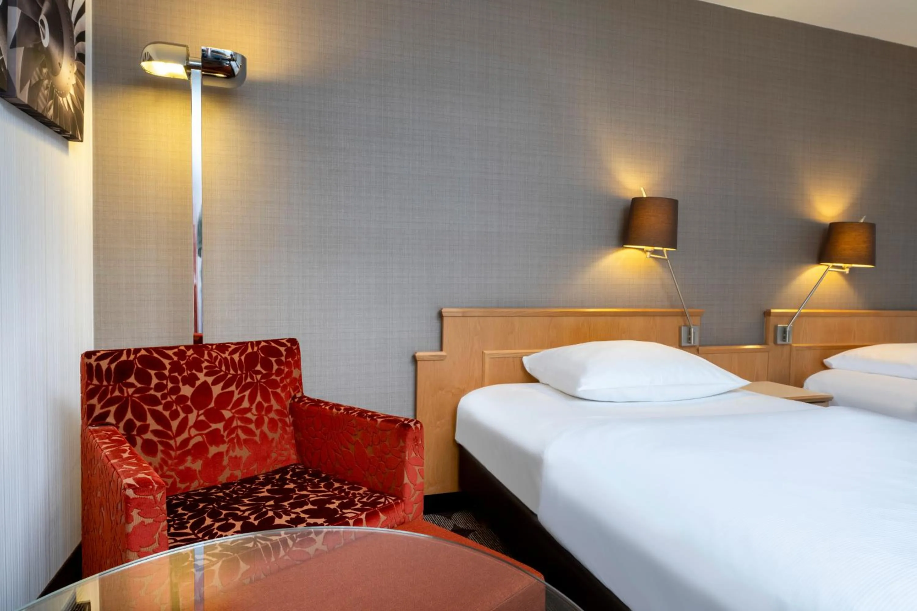 Photo of the whole room, Bed in Mövenpick Hotel Nürnberg Airport