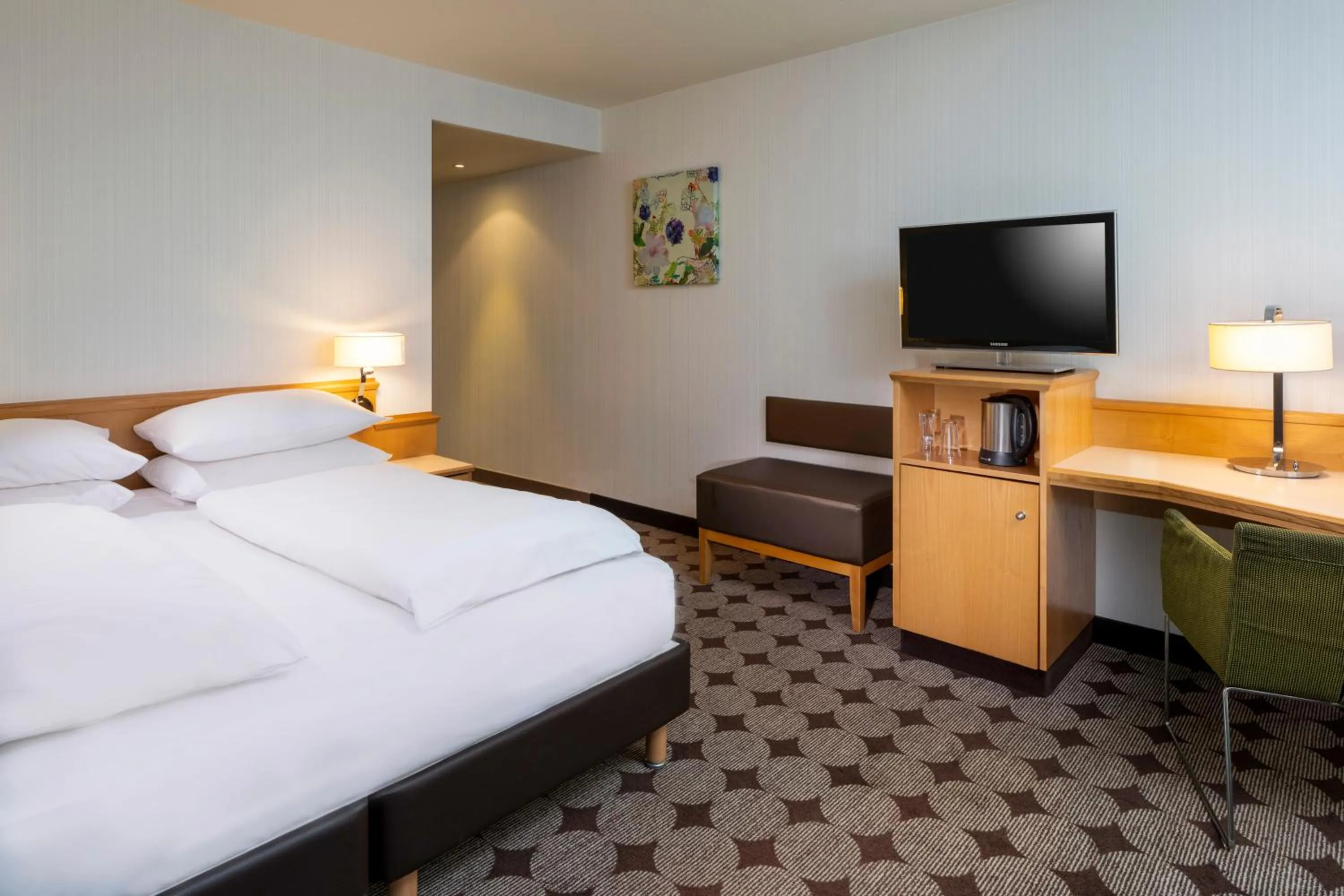 Photo of the whole room, Bed in Mövenpick Hotel Nürnberg Airport