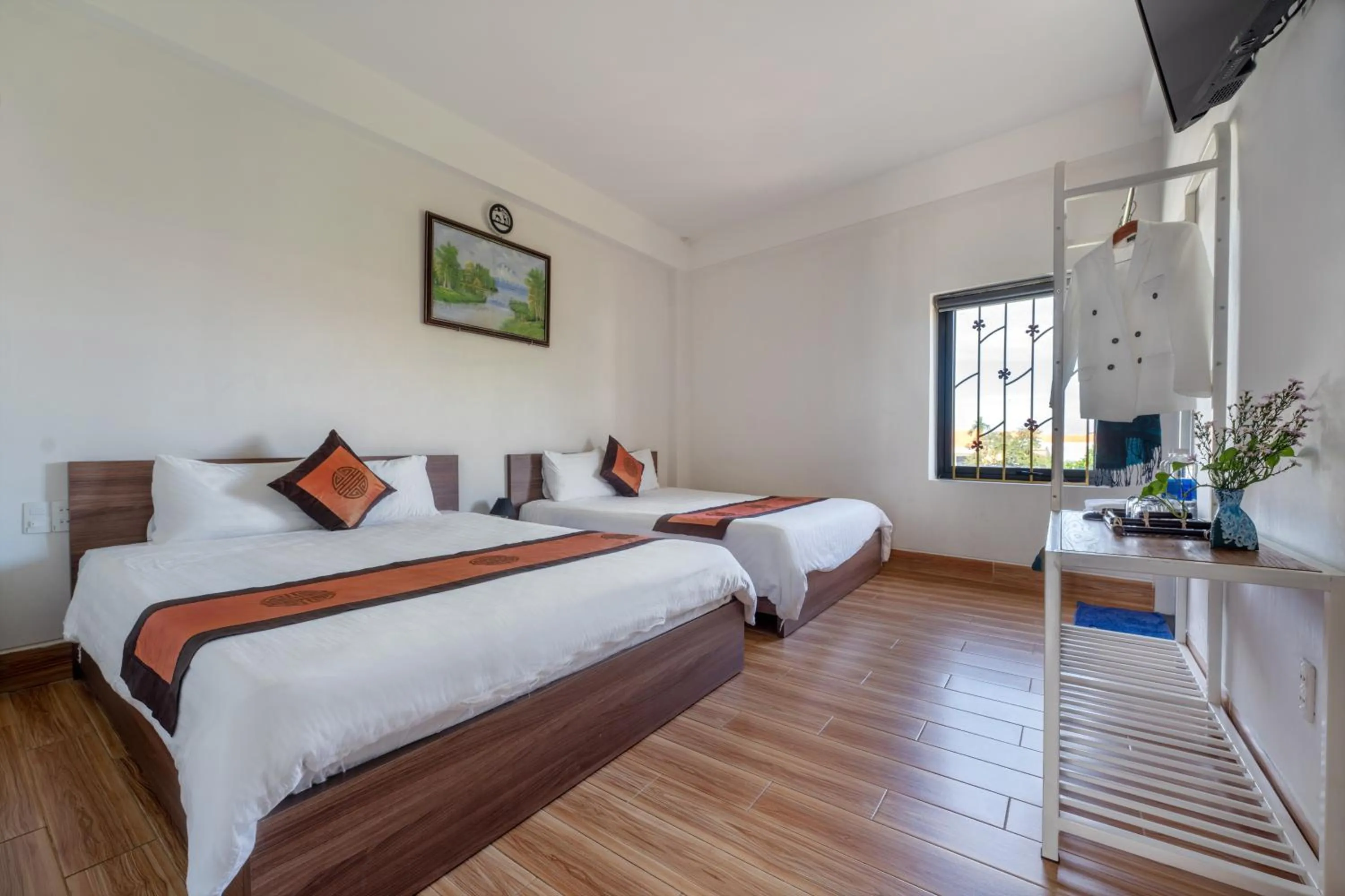 Photo of the whole room, Bed in Lavila Homestay Hoi An