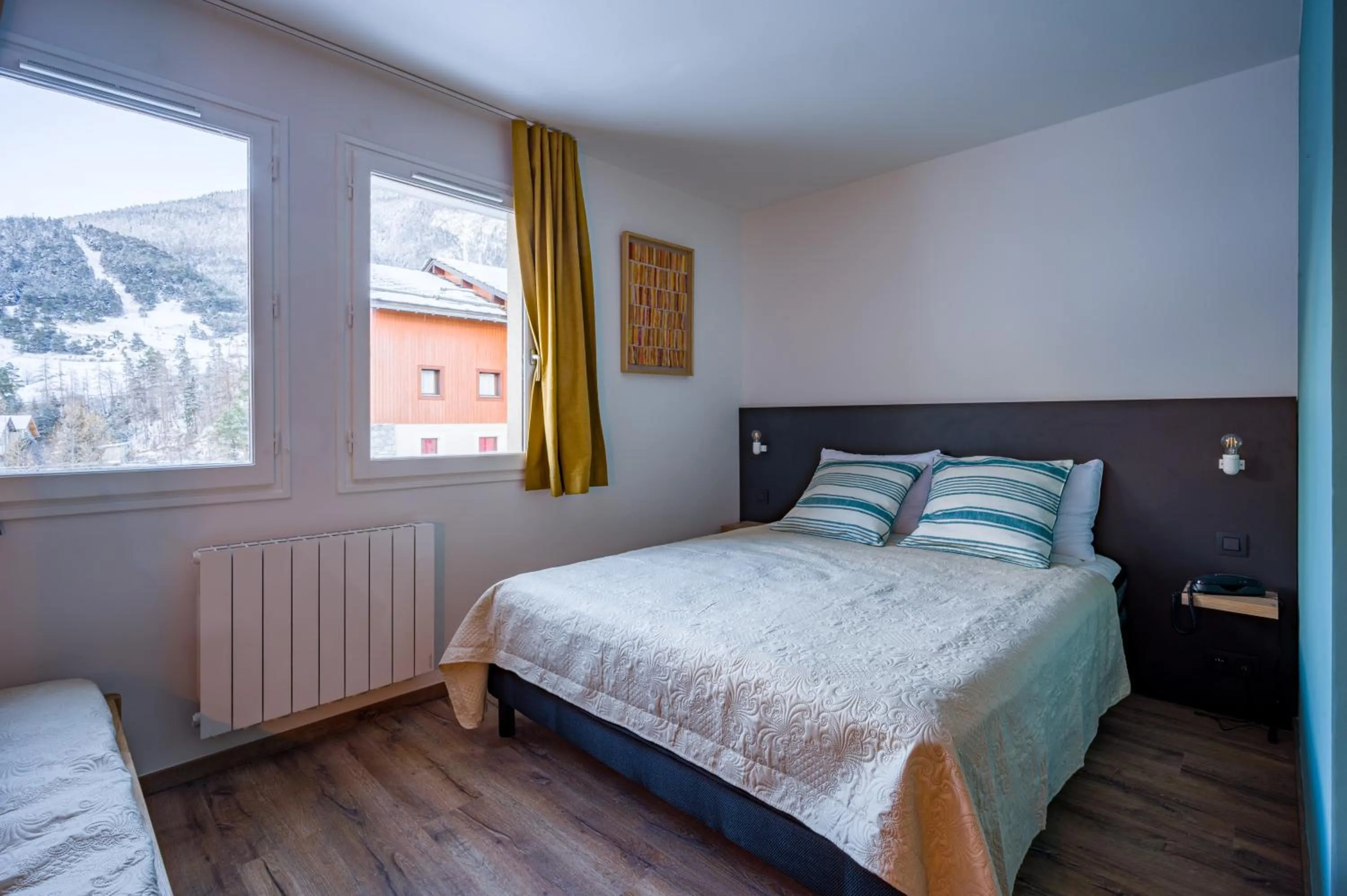 Bed in L'Outa Hotel Restaurant