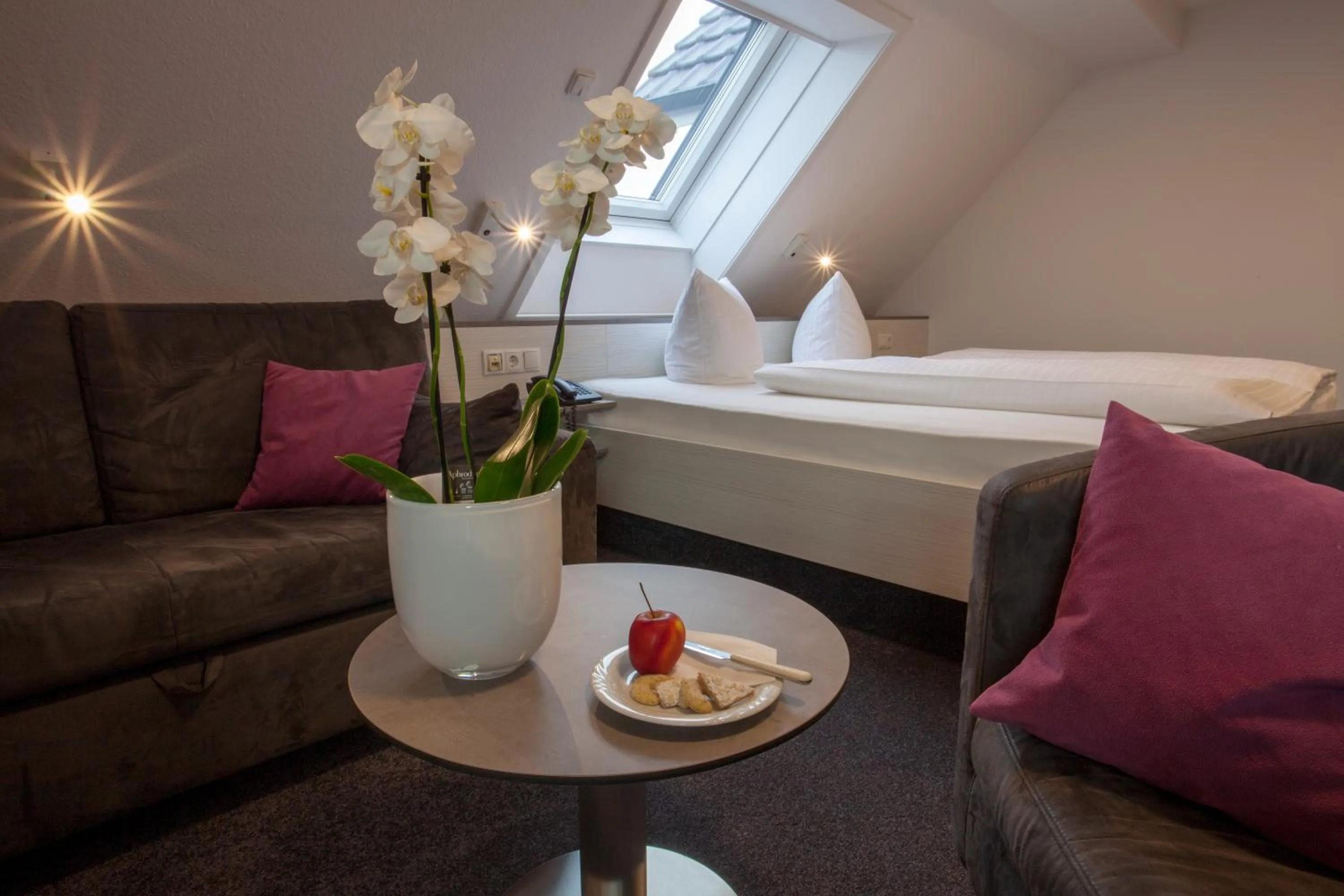 Seating area, Bed in Ebner - Boutique-Hotel & Konditorei