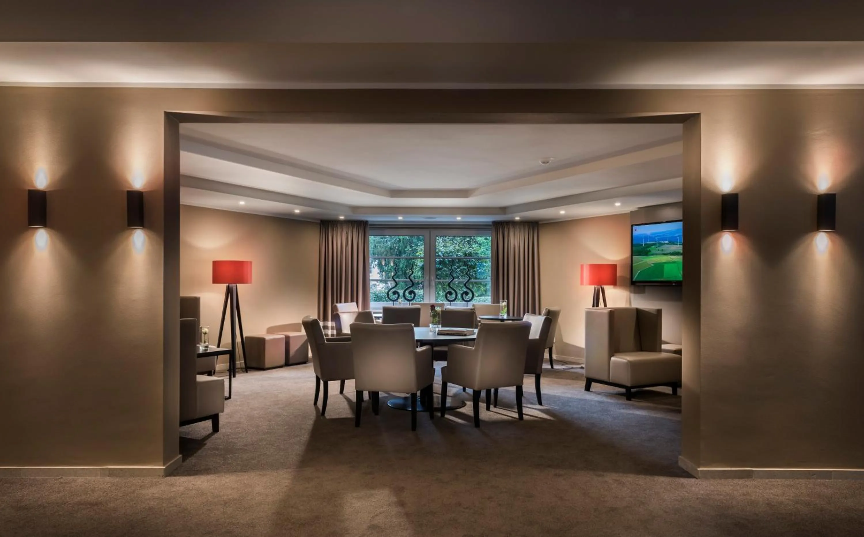 Communal lounge/ TV room in relexa hotel Harz-Wald Braunlage