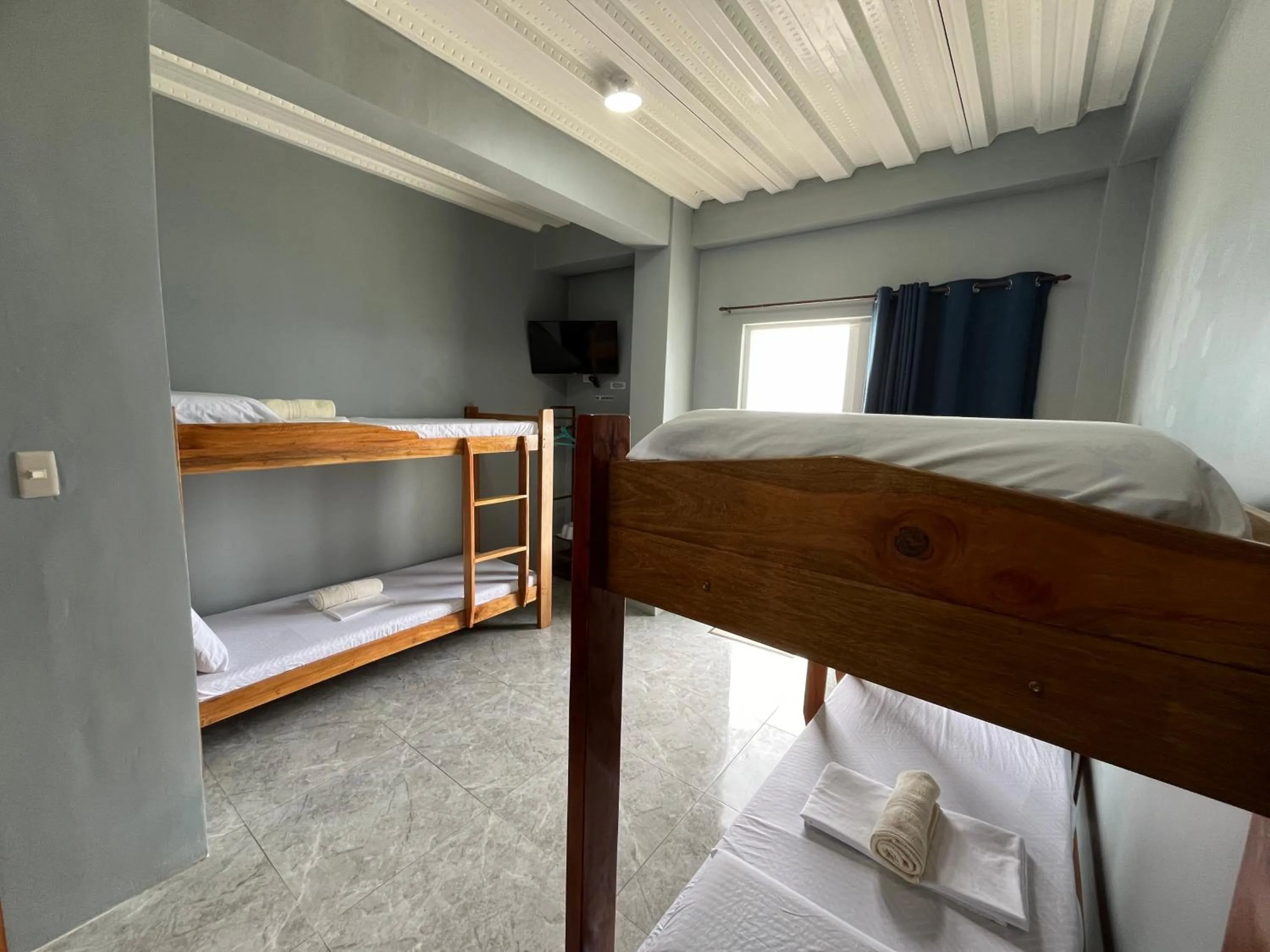 Bed in GOLDEN SUNSET INN