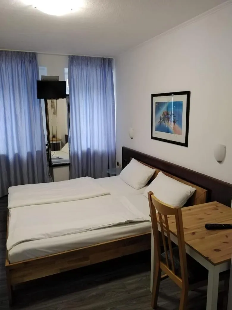 Bed in Hotel Berliner Hof