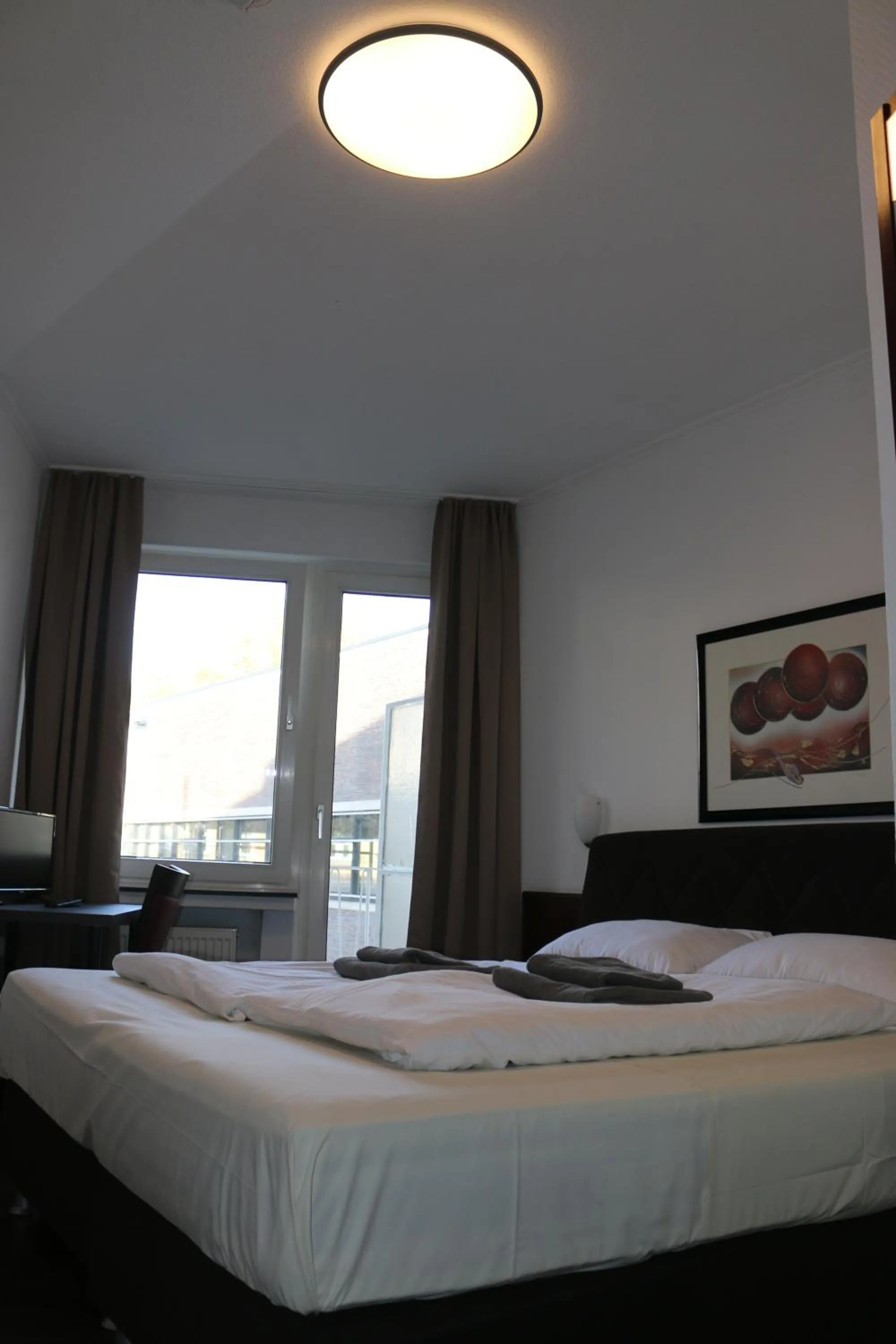 Bed in Hotel Berliner Hof