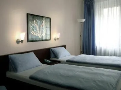 Bed in Hotel Berliner Hof