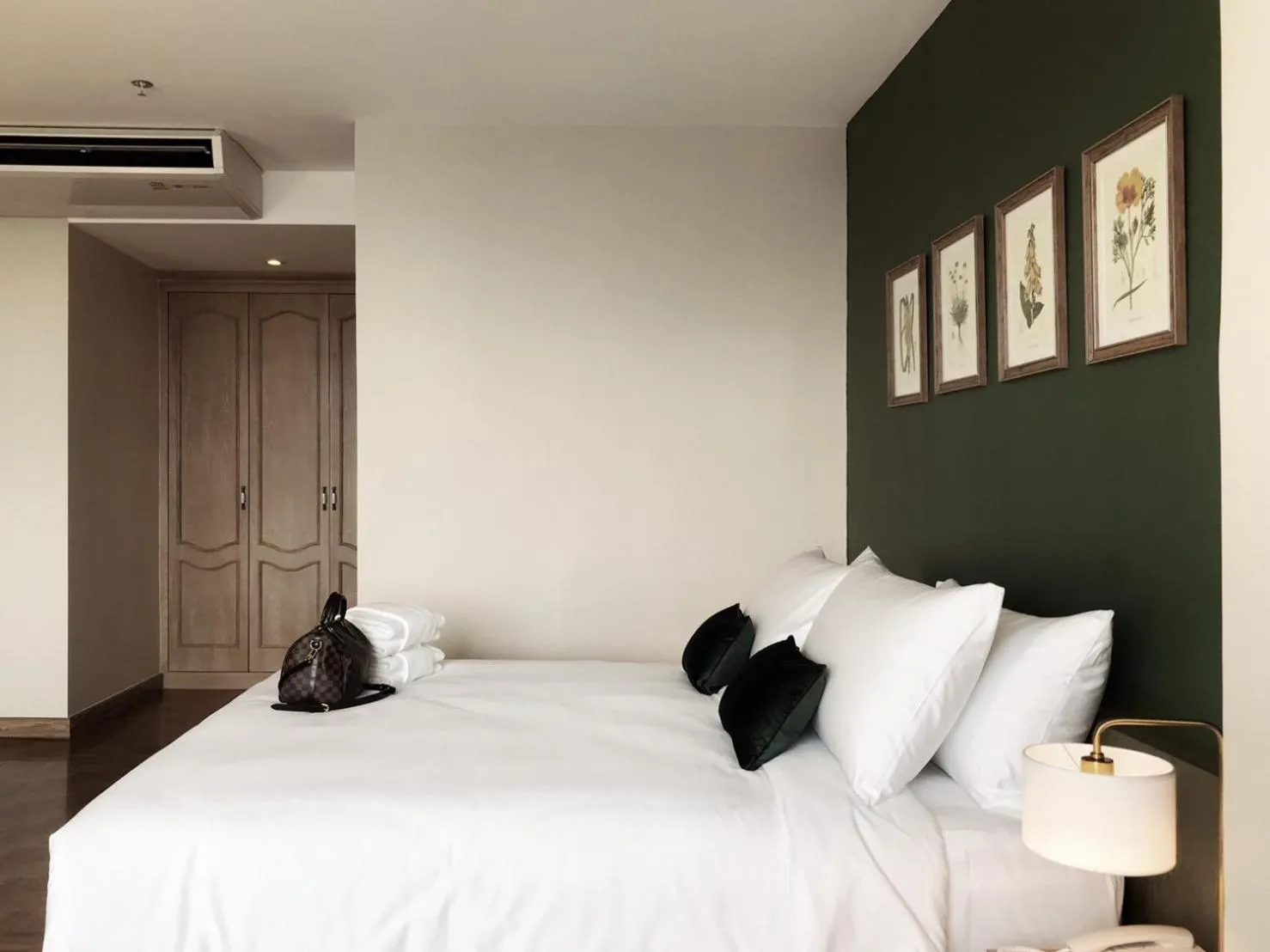 Bed in The Raintree Hotel Chiang Mai