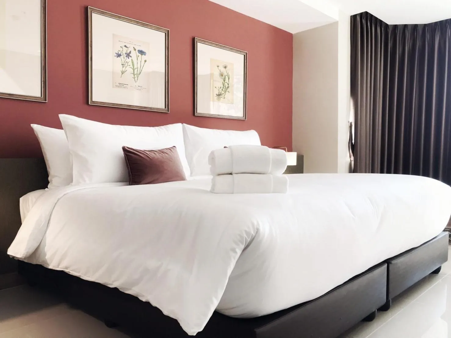 Bed in The Raintree Hotel Chiang Mai