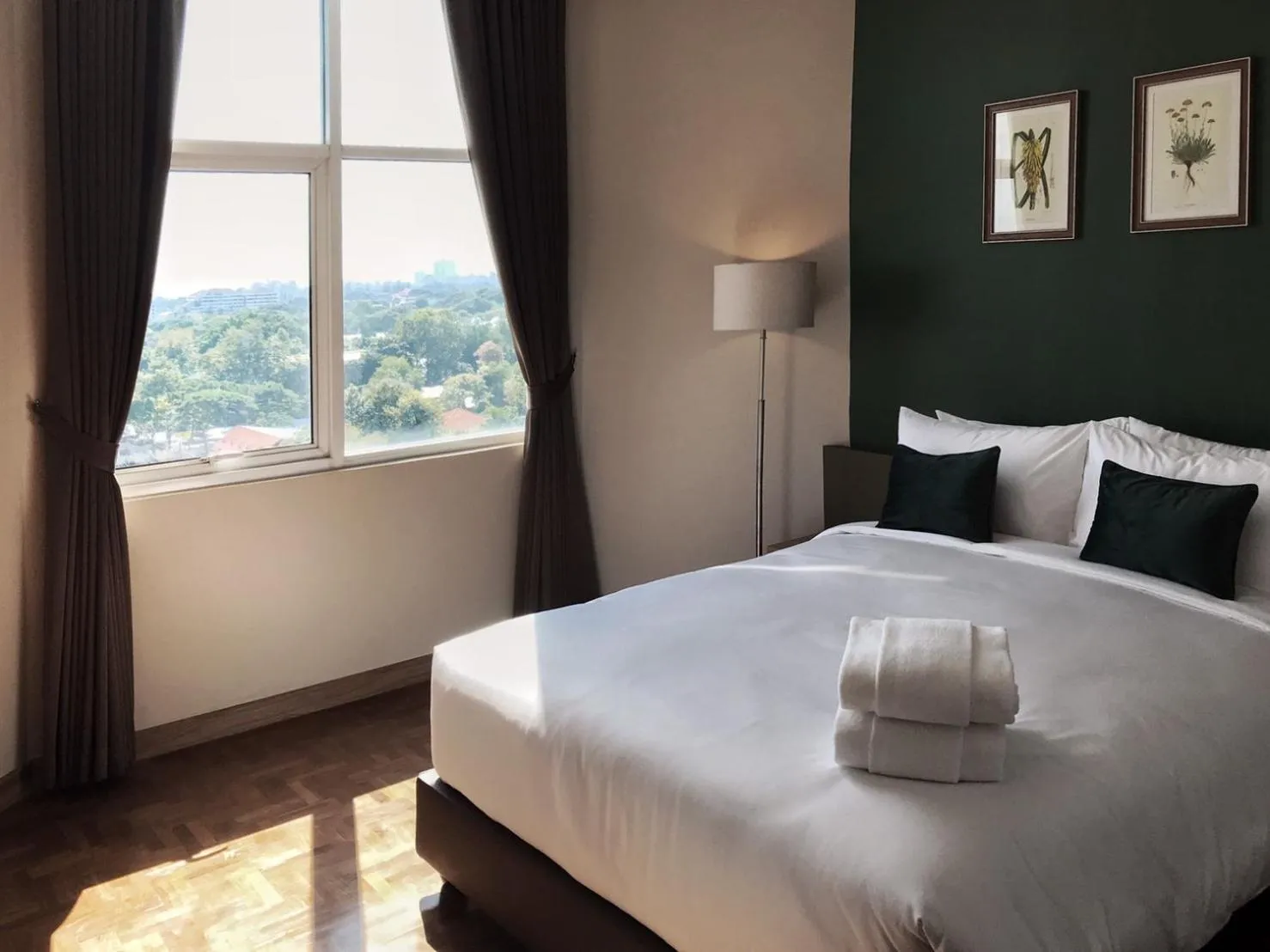 Bed in The Raintree Hotel Chiang Mai