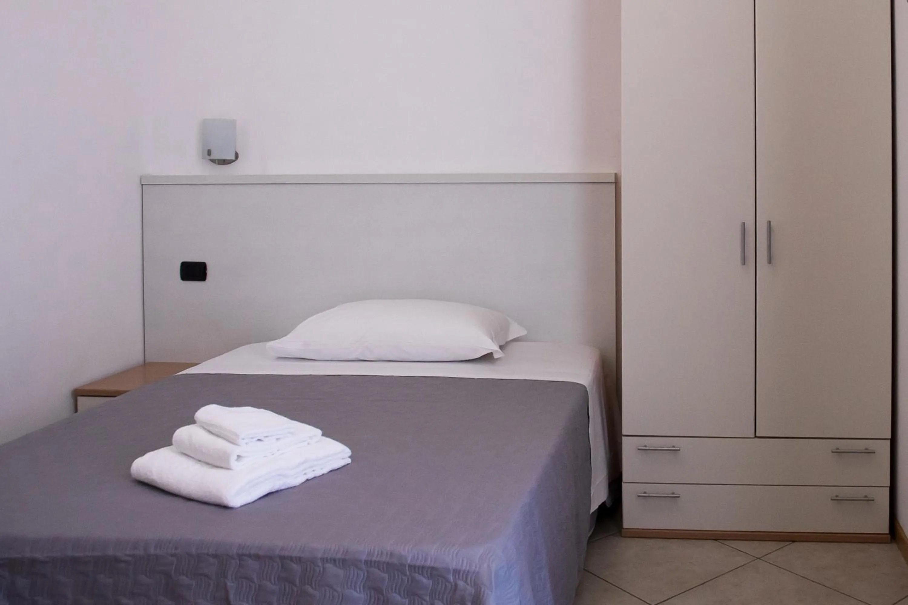 Bed in Hotel Amico