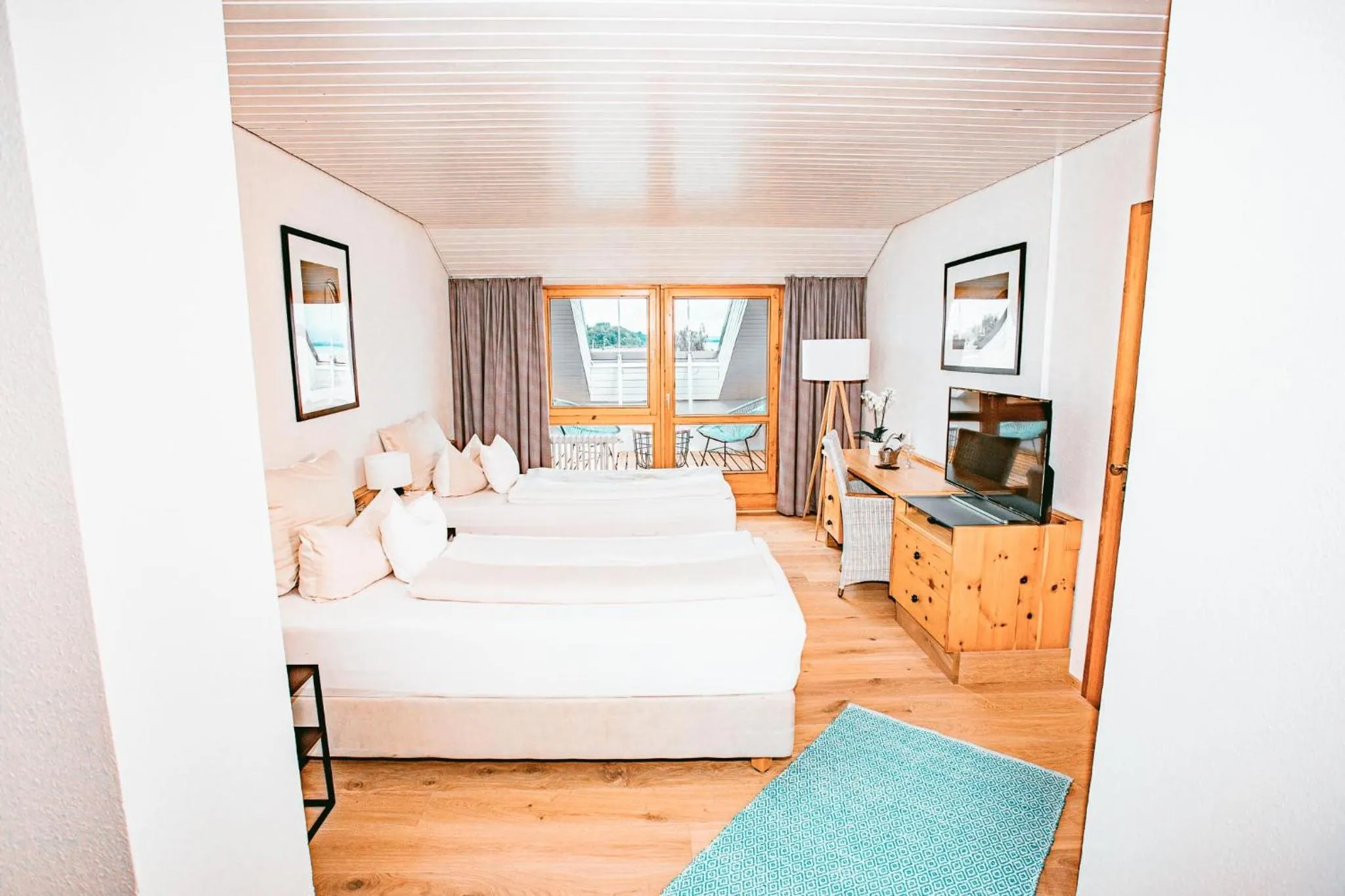 Bedroom, Bed in Yachthotel Chiemsee GmbH