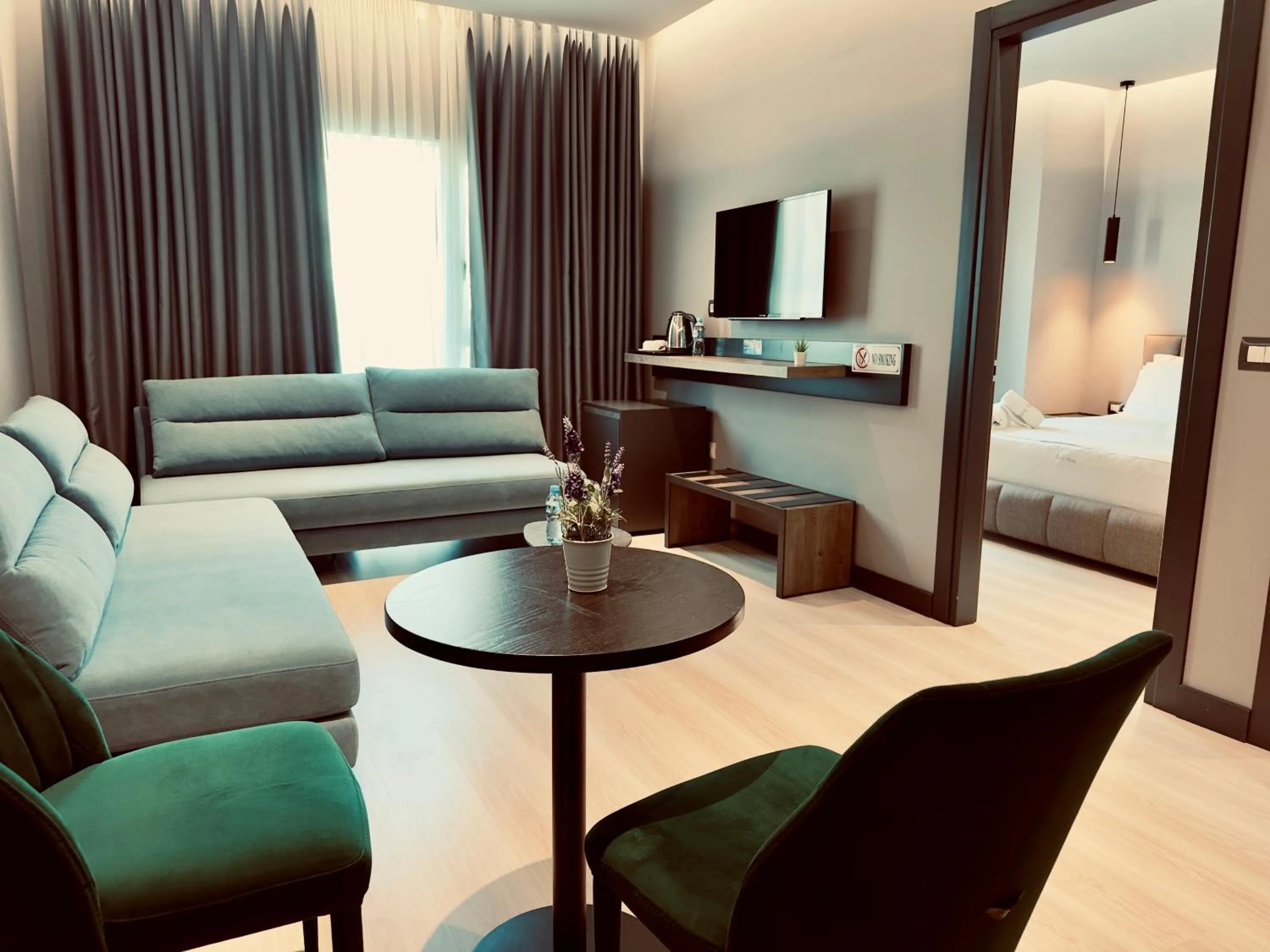 Communal lounge/ TV room in Hotel Olive