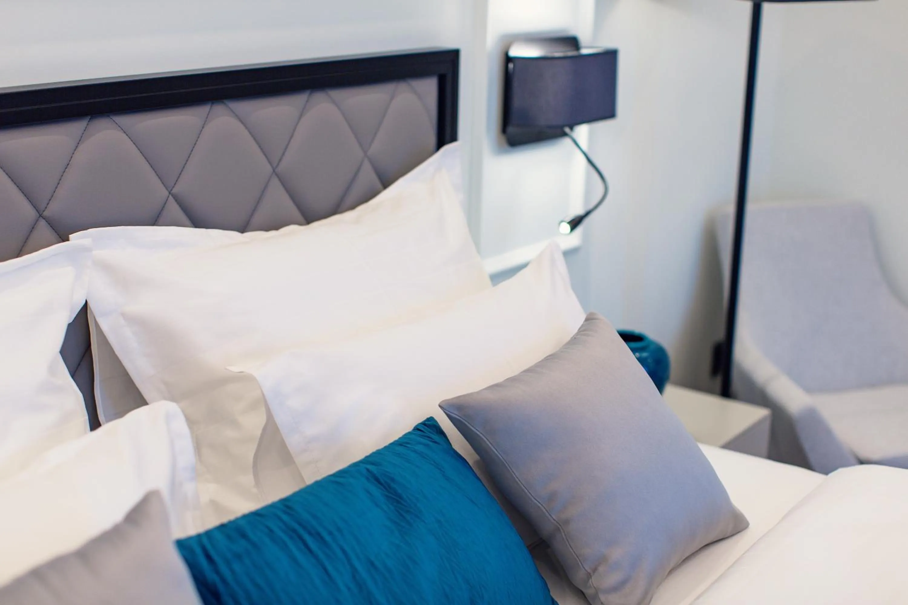 Decorative detail, Bed in Boutique Hotel Momentum by Aycon