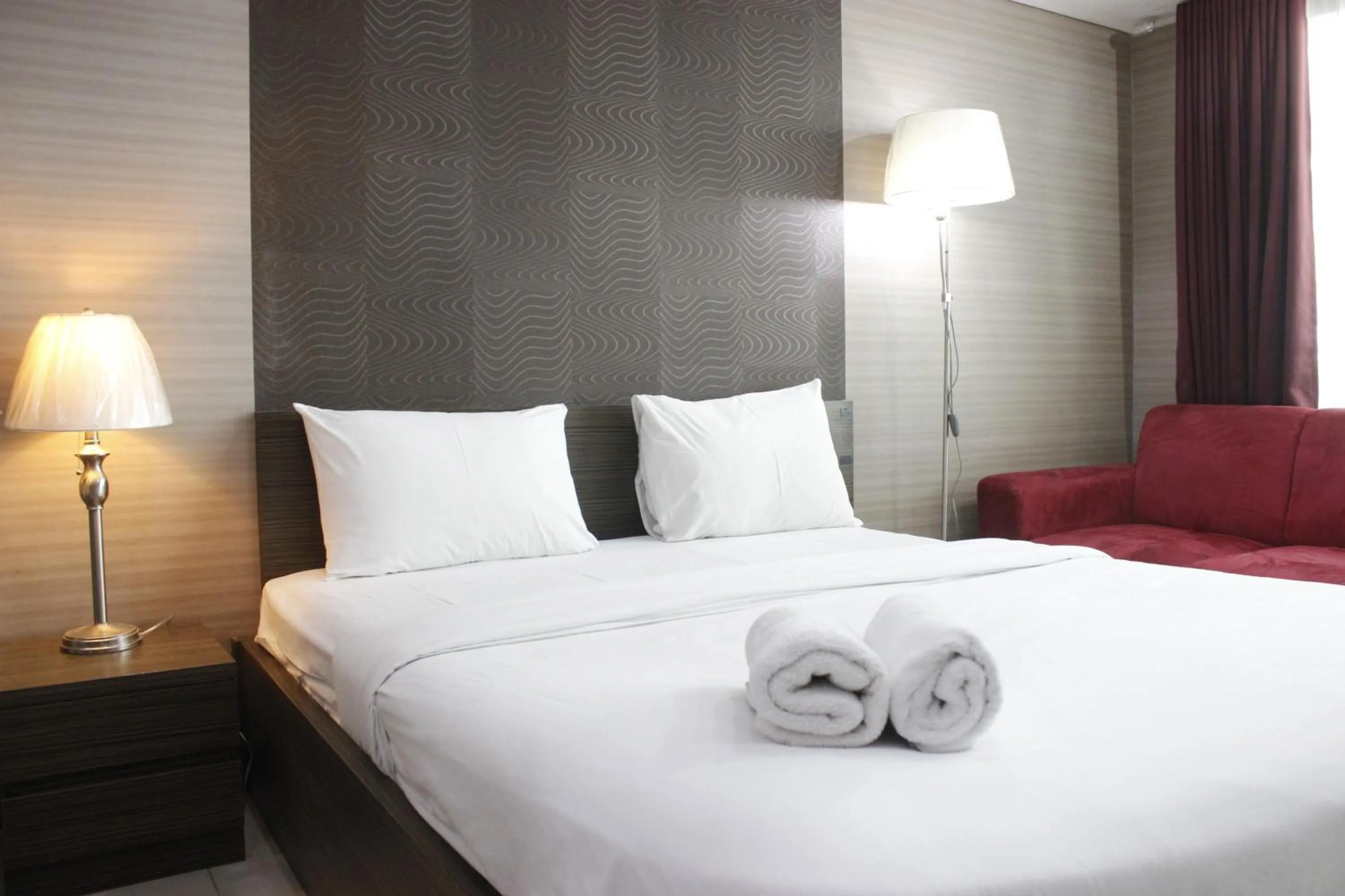 Bedroom, Bed in Prime and Comfy Studio at Tamansari La Grande Apartment By Travelio